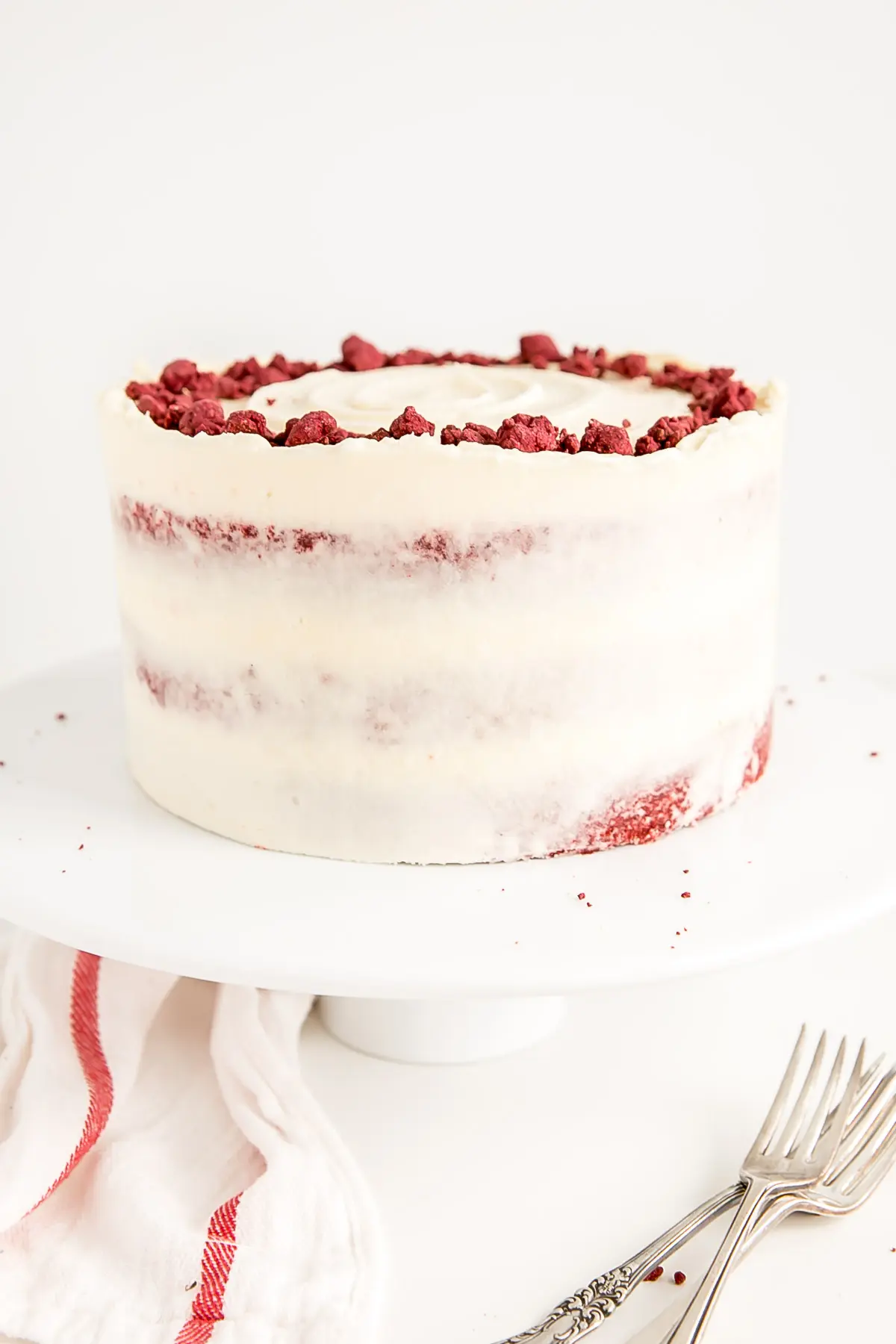 Angled shot of the cake on a cake stand.