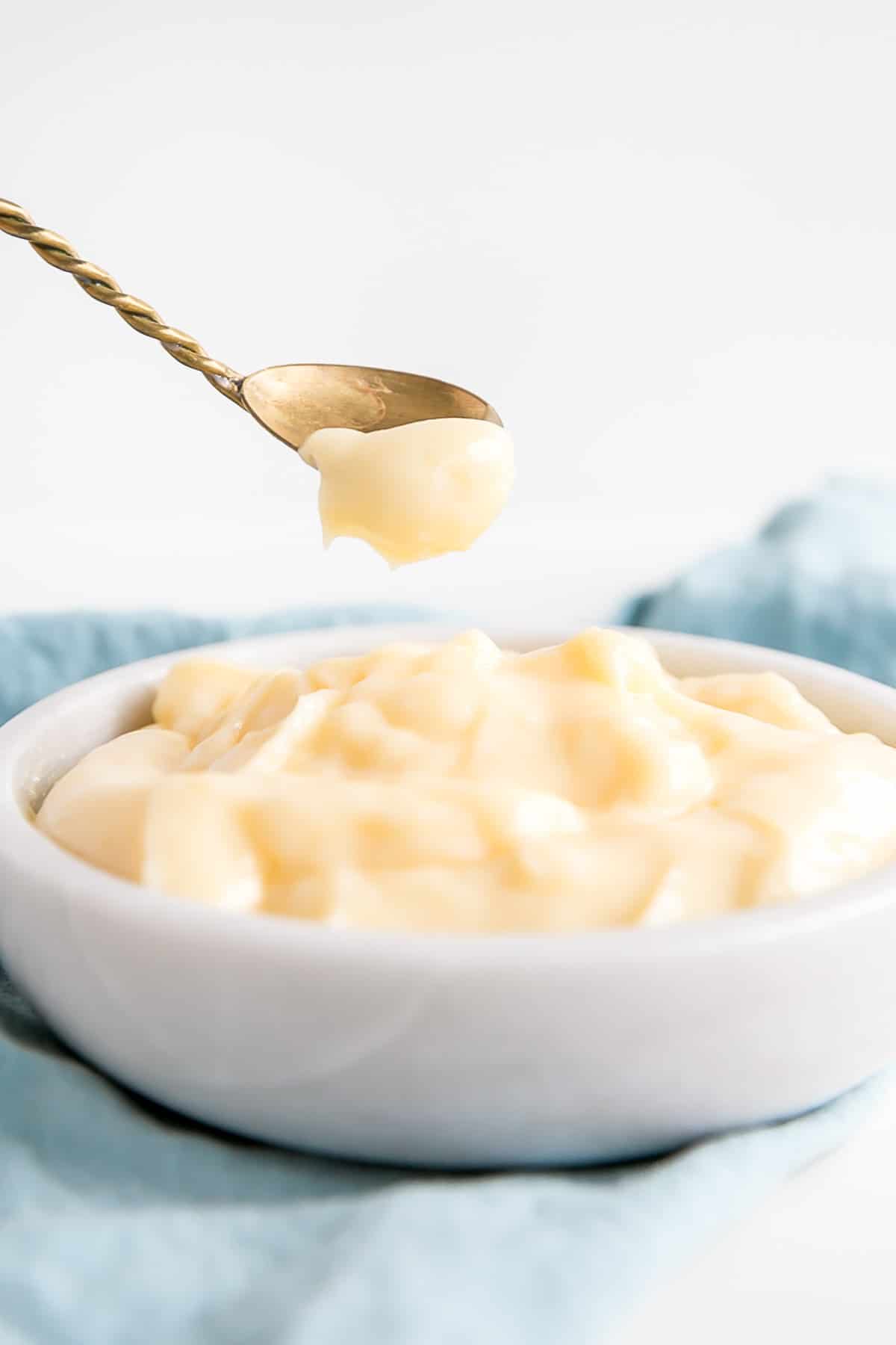 Vanilla custard on a spoon.