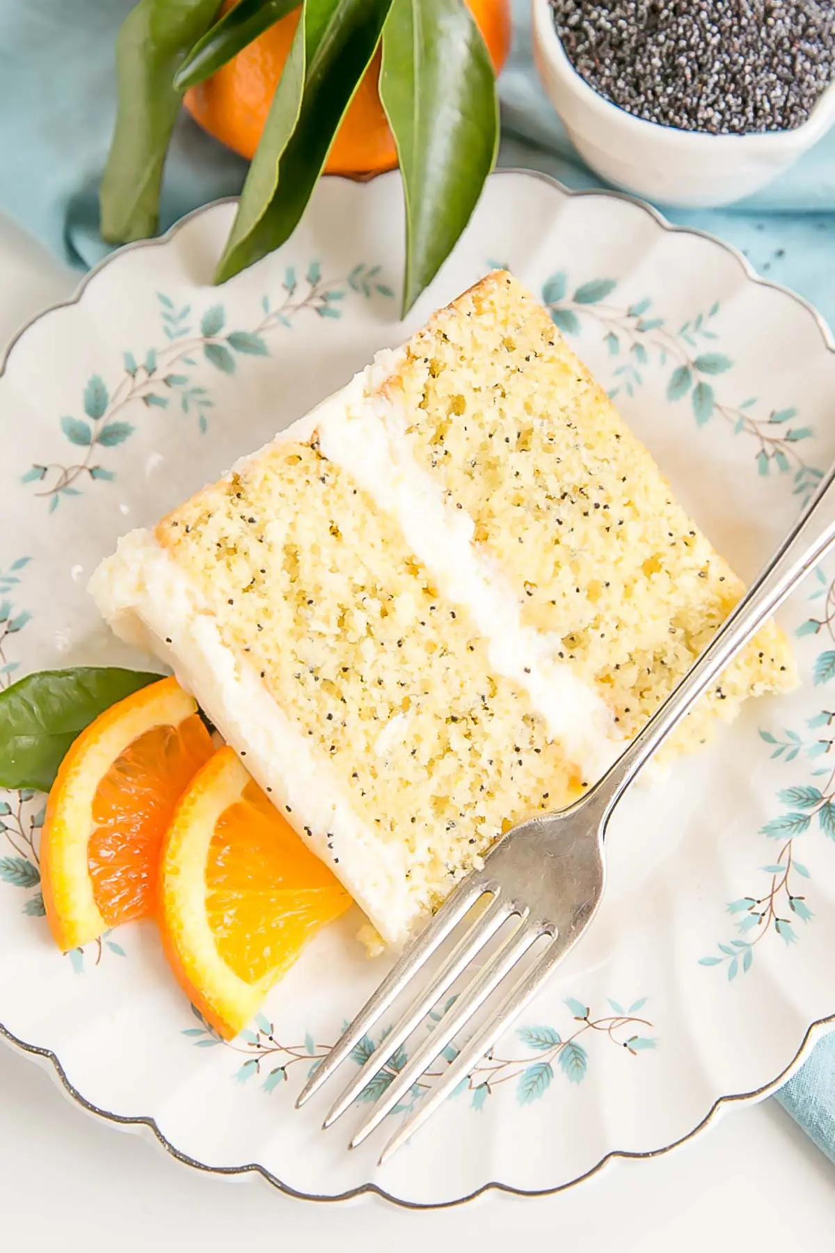 Slice of Orange Poppy Seed Cake on a plate.