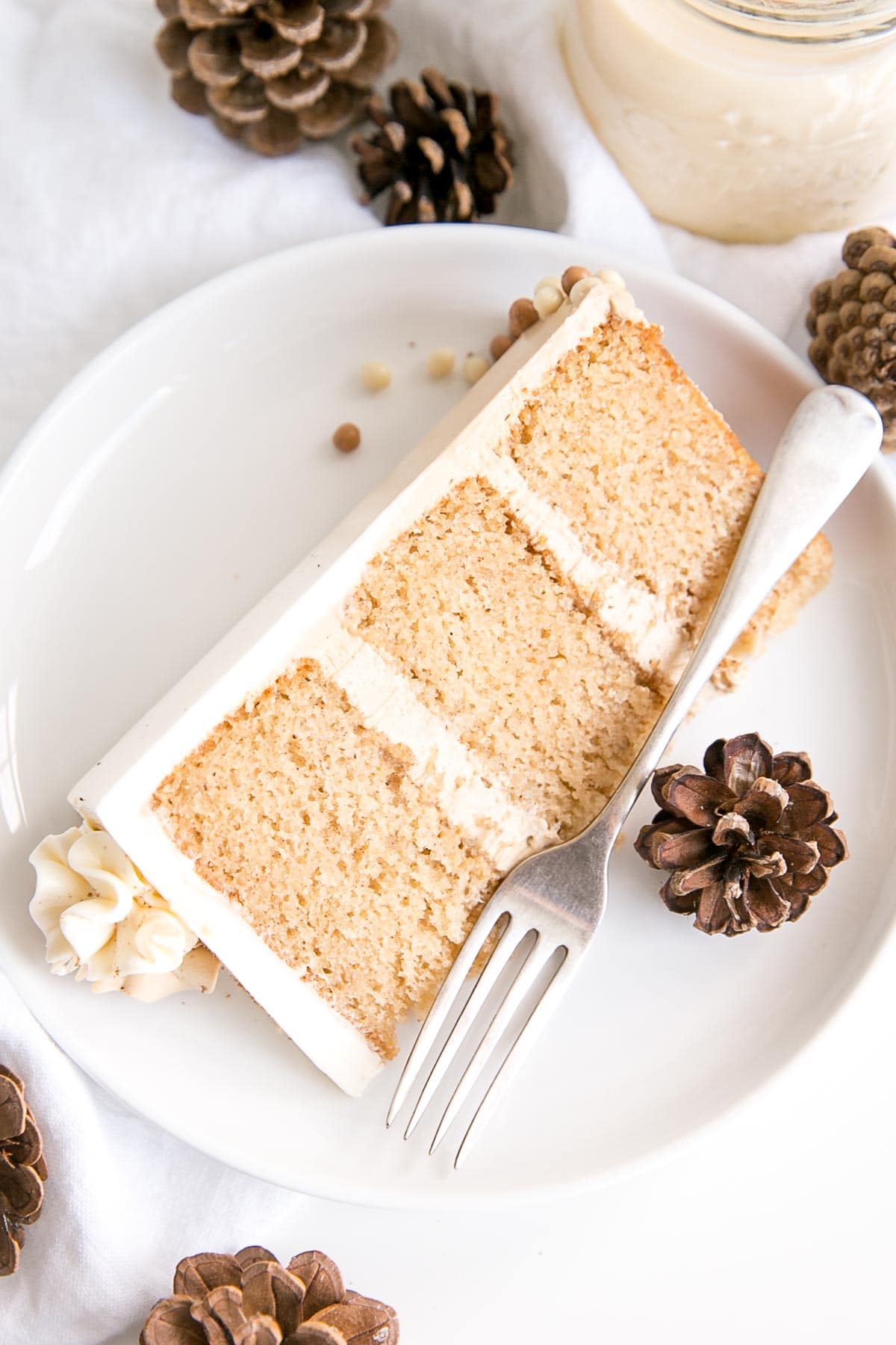 Slice of eggnog latte cake on a plate.