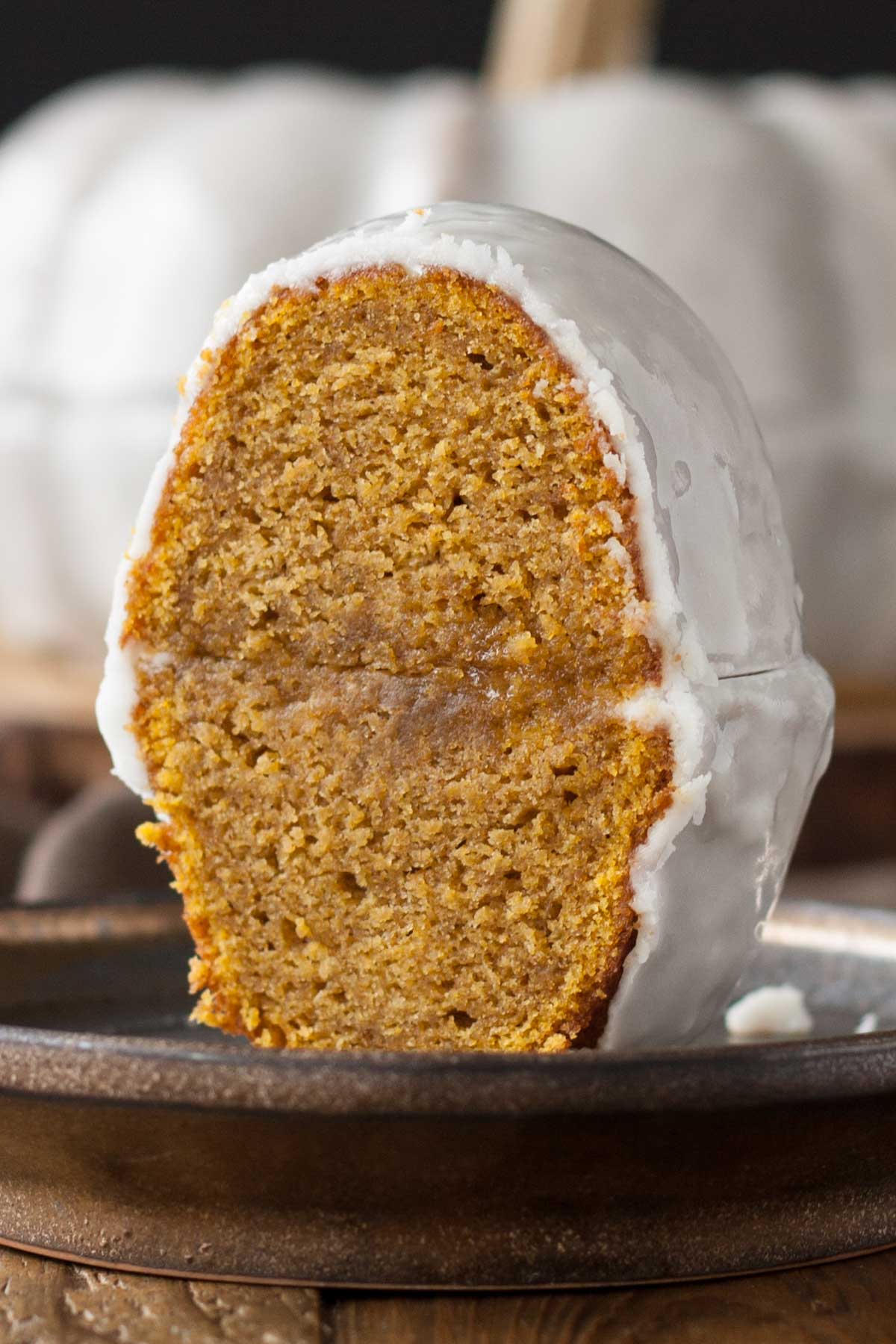 Close up of a slice of Bundt cake on a plate.