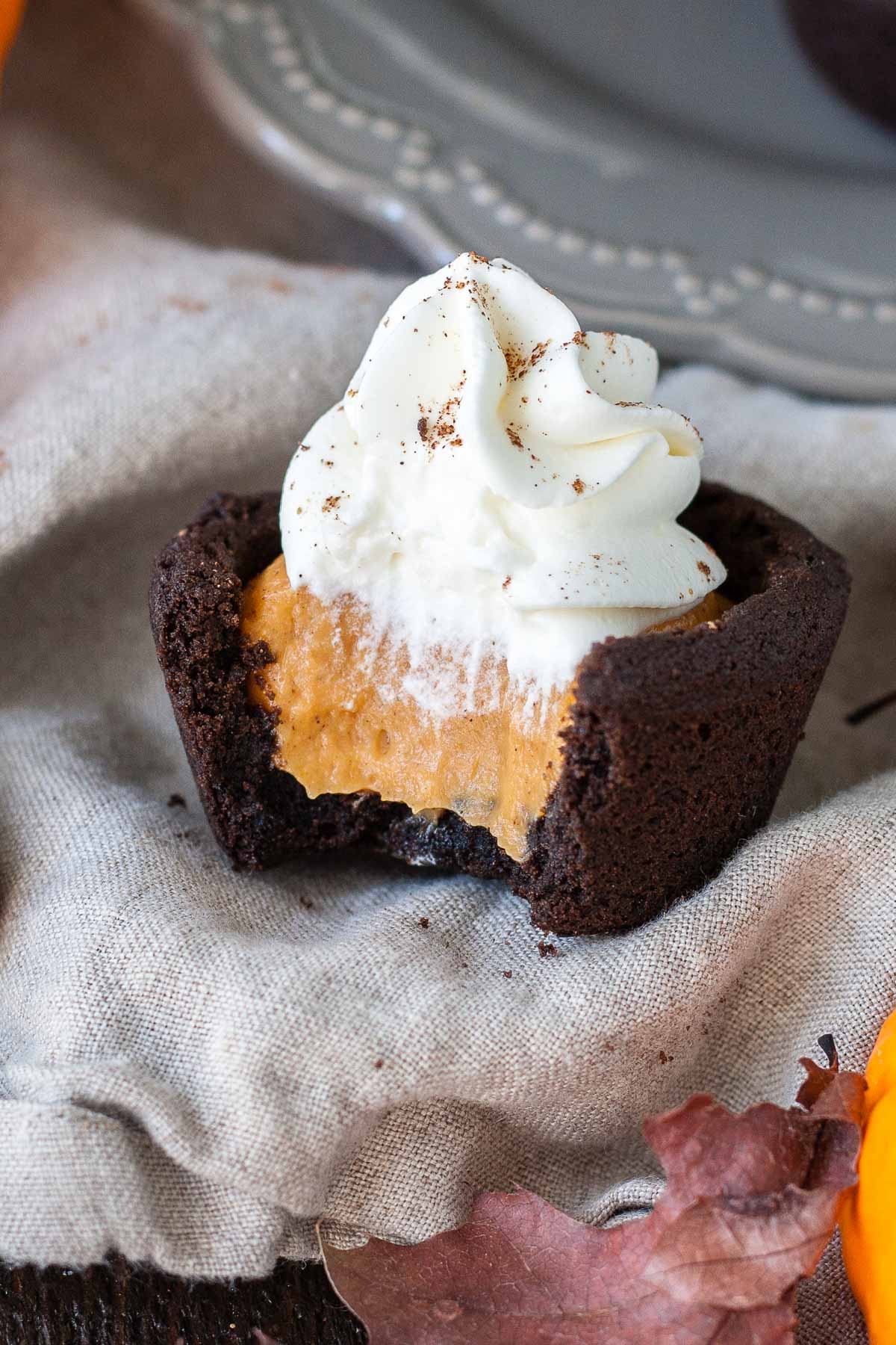 Cookie cup with a bite taken out.