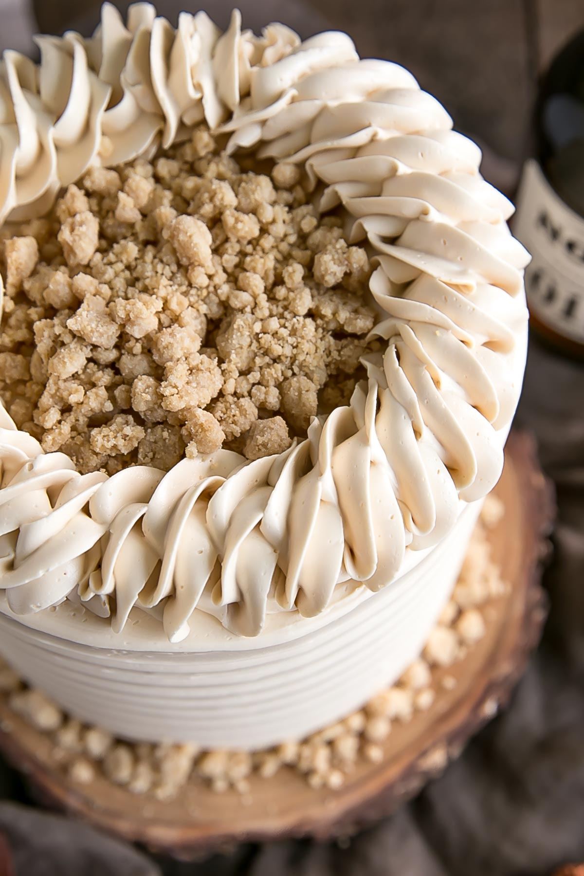 Overhead picture of maple cake showing maple streusel and rope border.