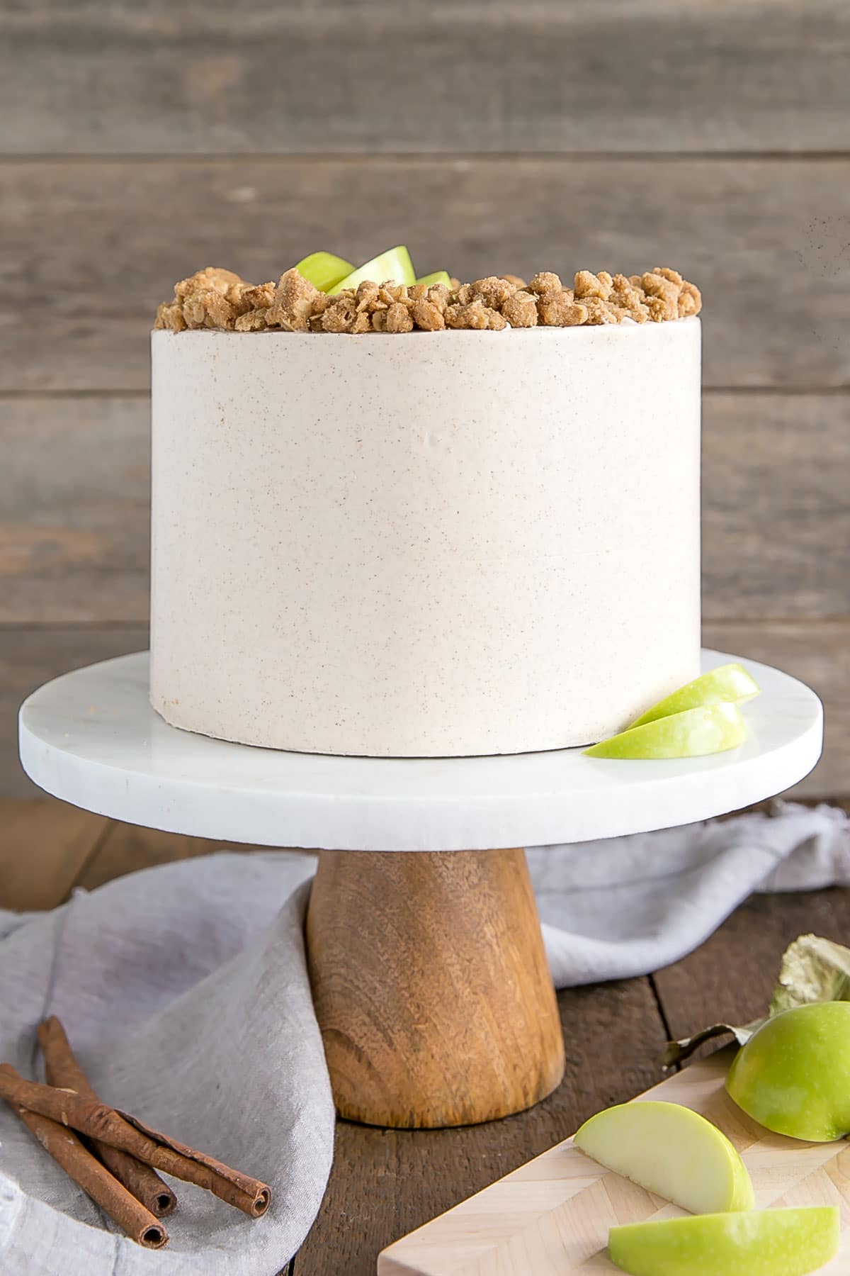 Cake on a rustic cake stand.