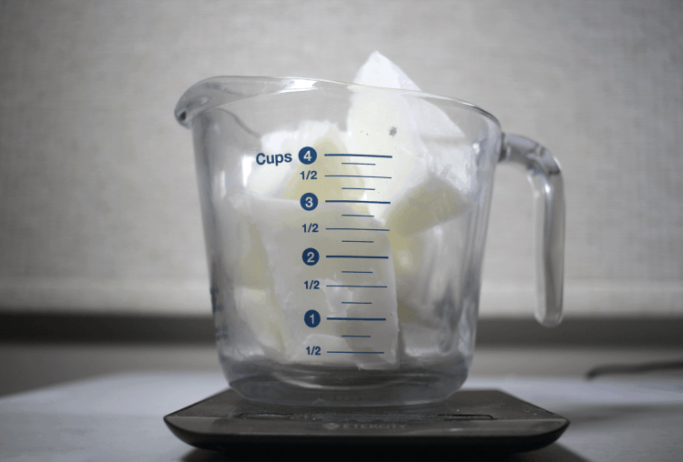 measure out one pound of wax into a measuring glass