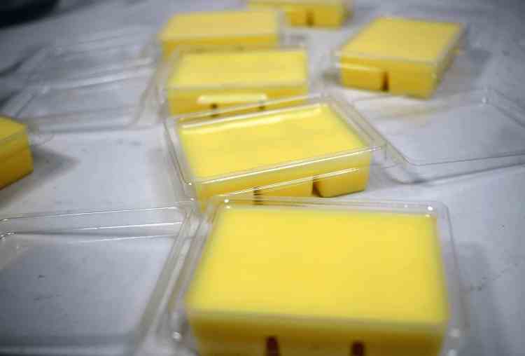 Wax melts will typically cool into a lighter shade compared to when they were a liquid