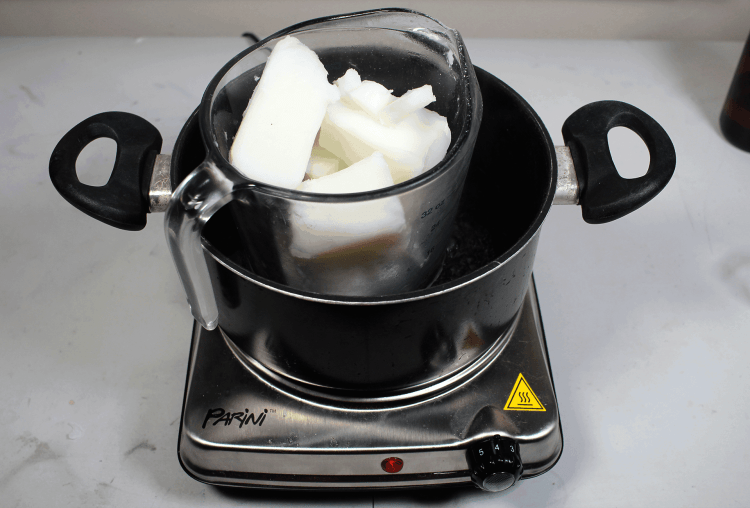 place the wax into the boiling water
