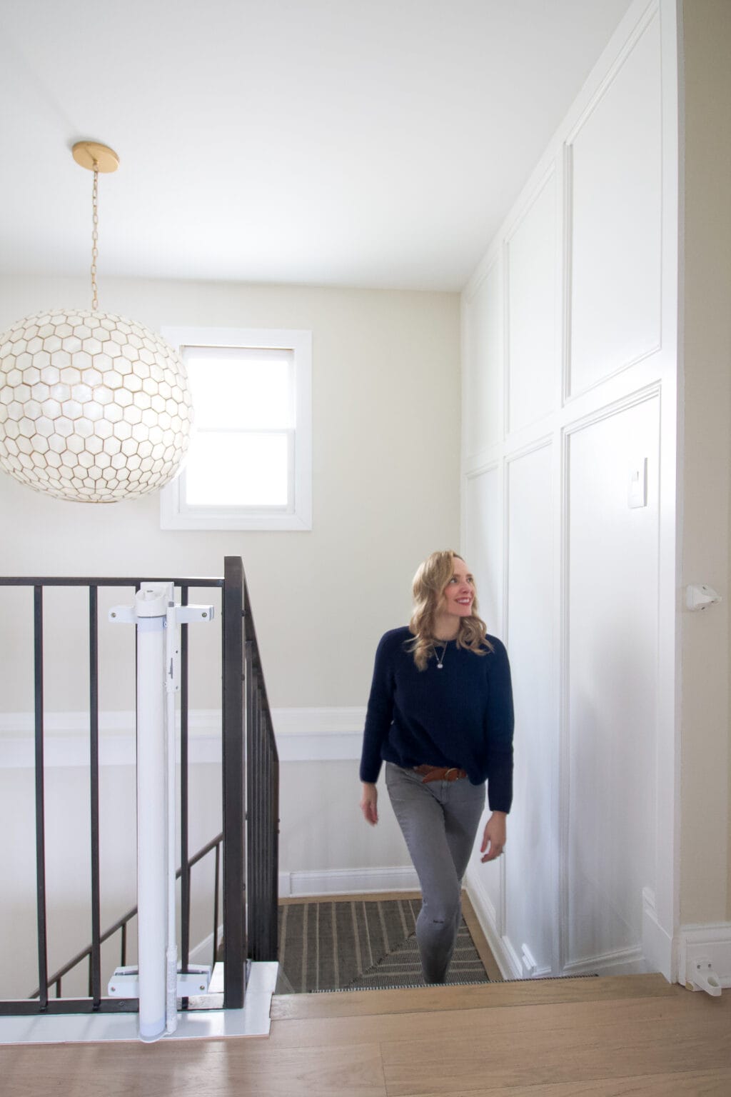 A look at our new stairwell accent wall with a wood design