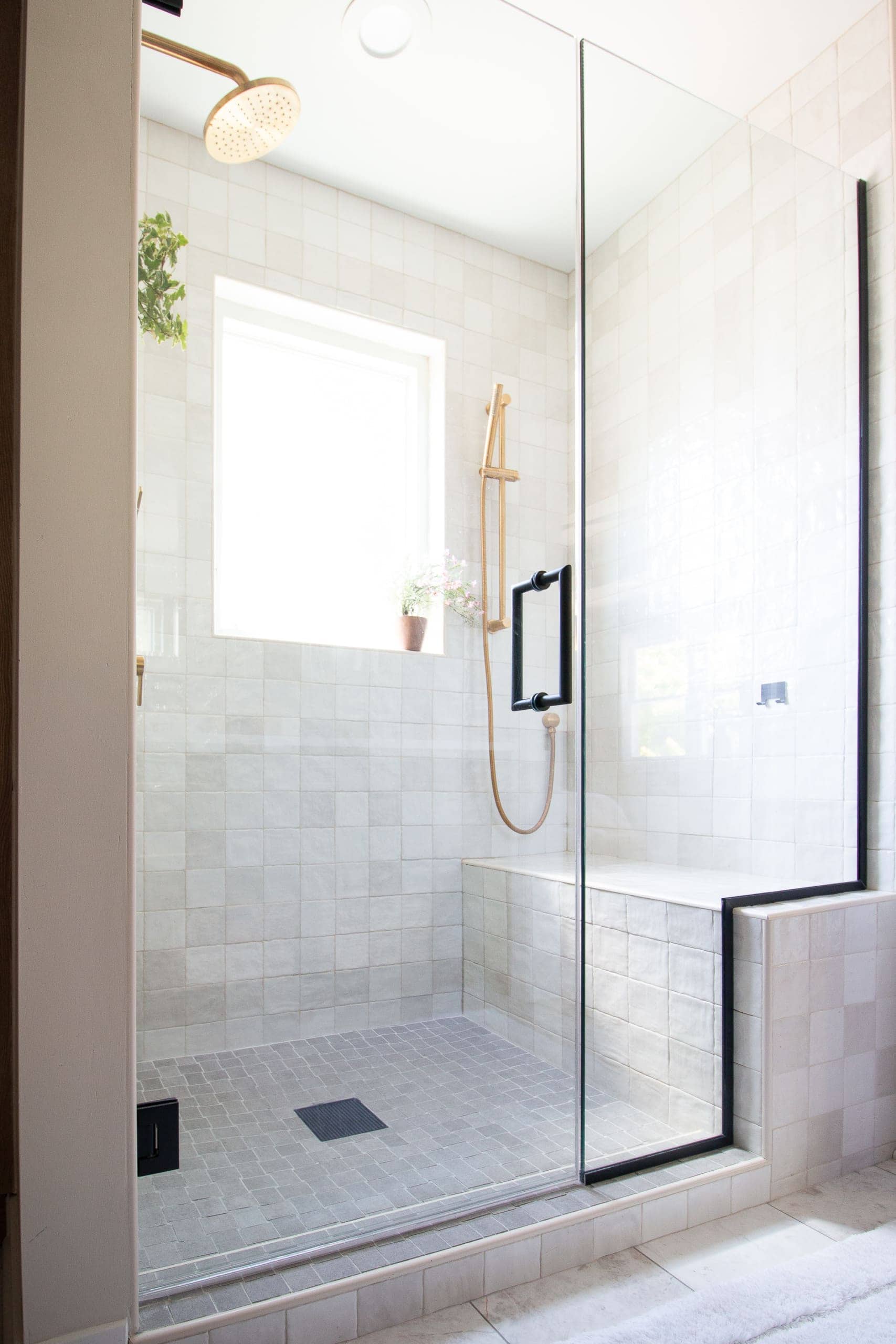 The tile in our black and gold marble bathroom