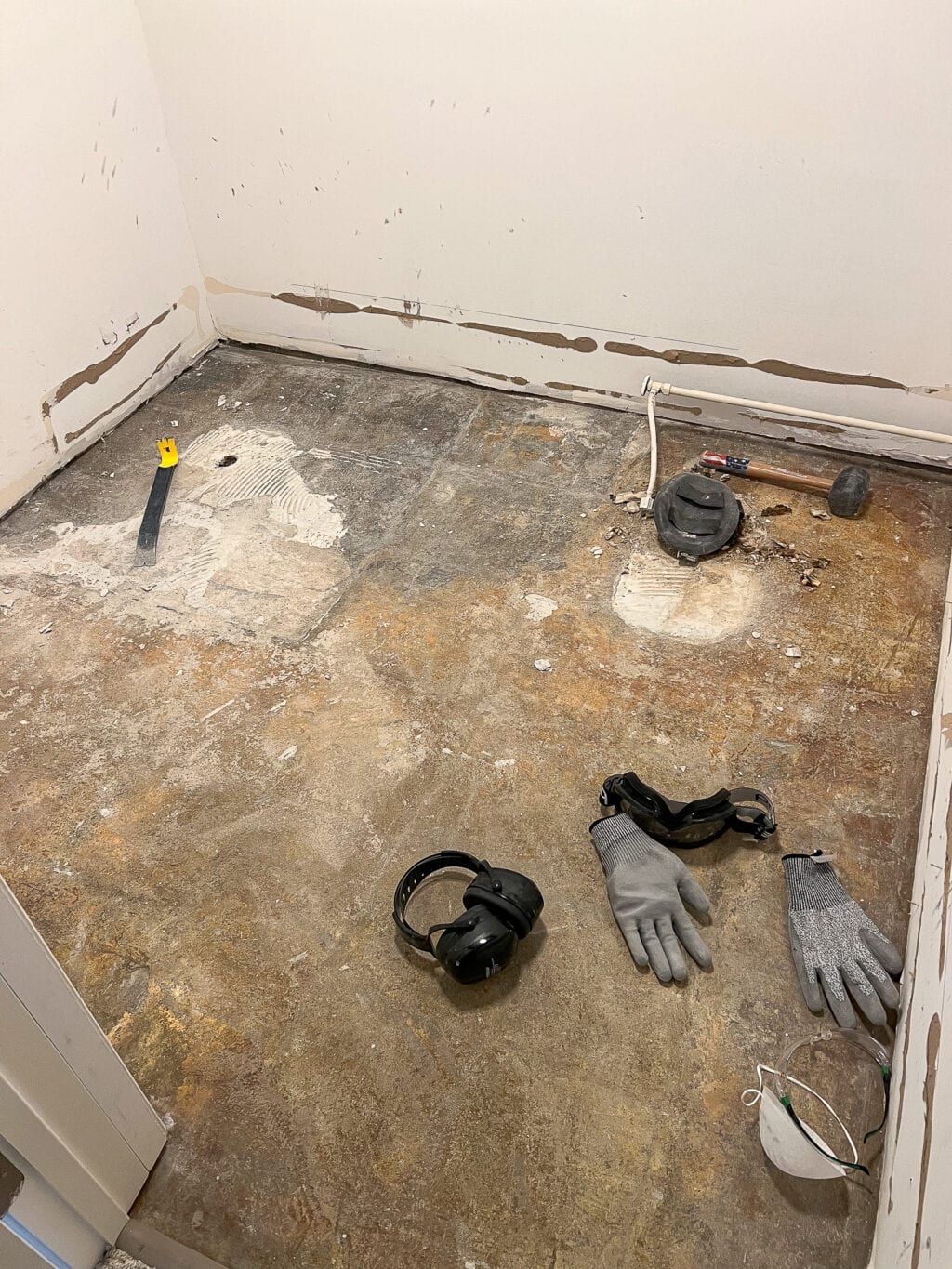 how to remove floor tile and demo a bathroom