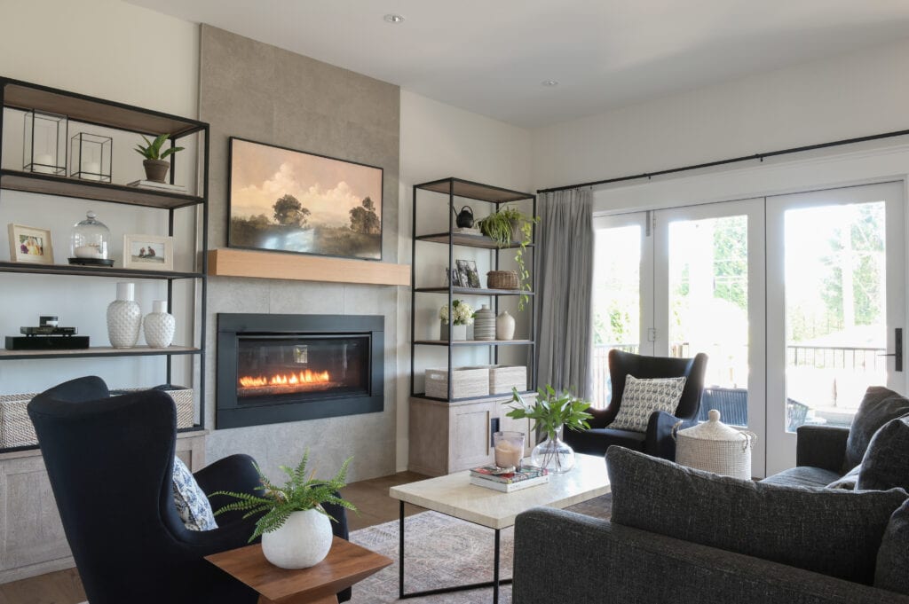 A fireplace surrounded by bookshelves 