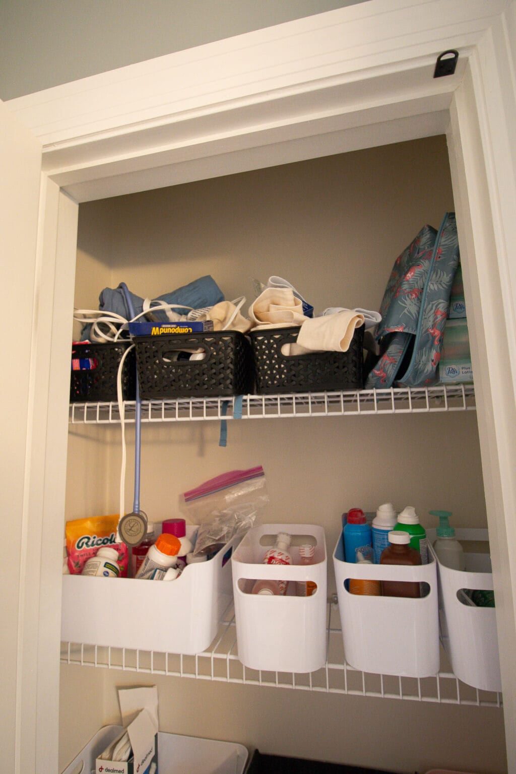 The kids' bathroom closet ready to explode