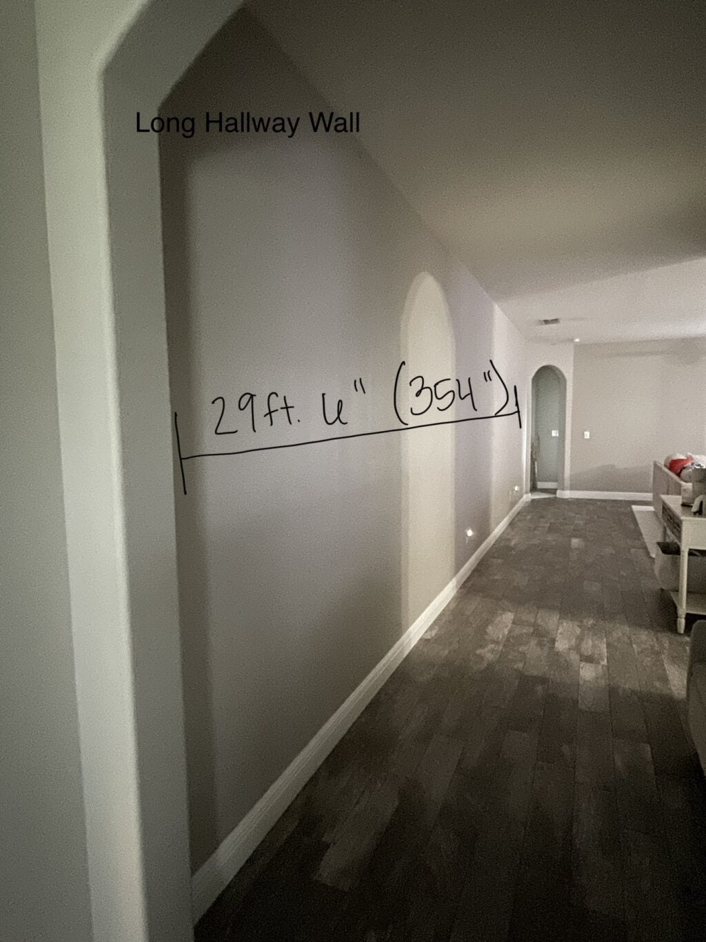 How do I decorate a long hallway?