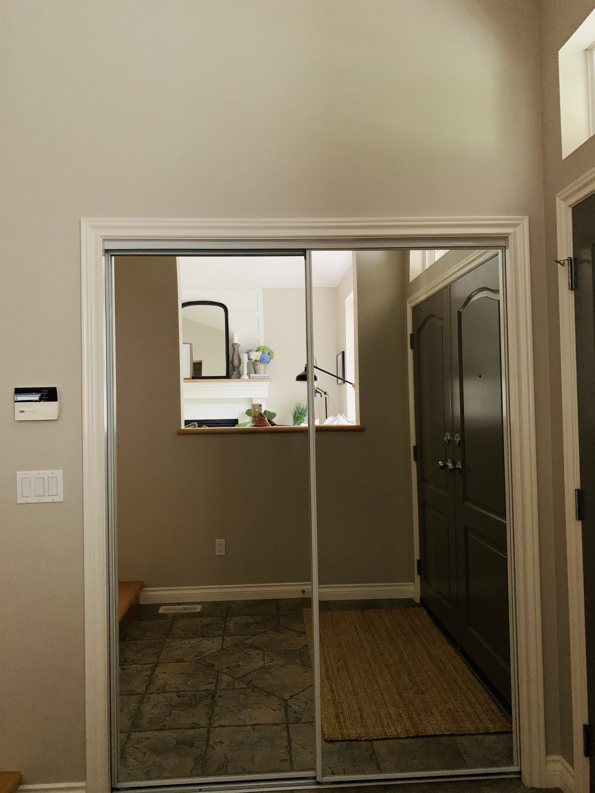 Mirrored closet before