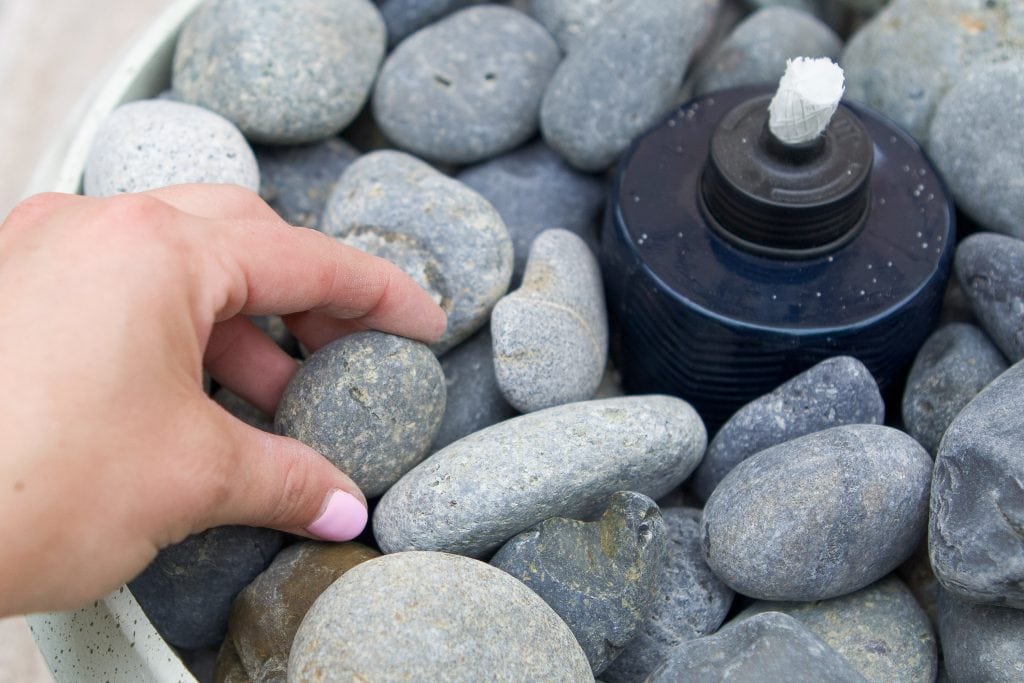 Adding Mexican beach pebbles to my fire bowl