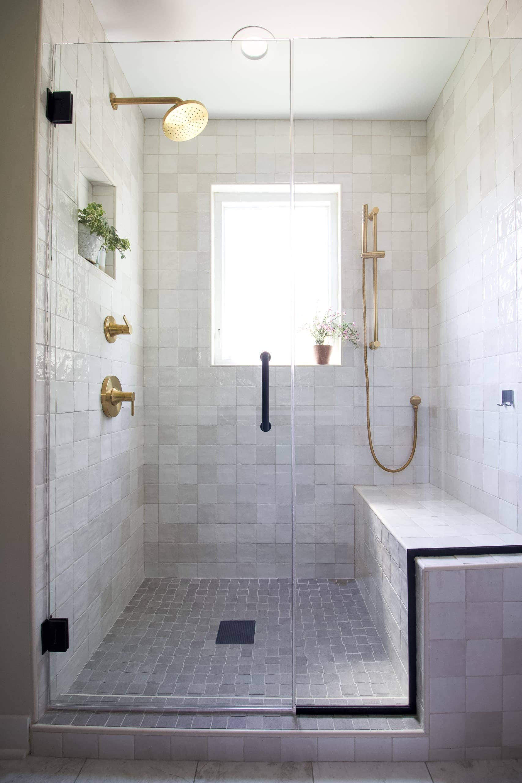 Our new shower in our black and gold marble bathroom