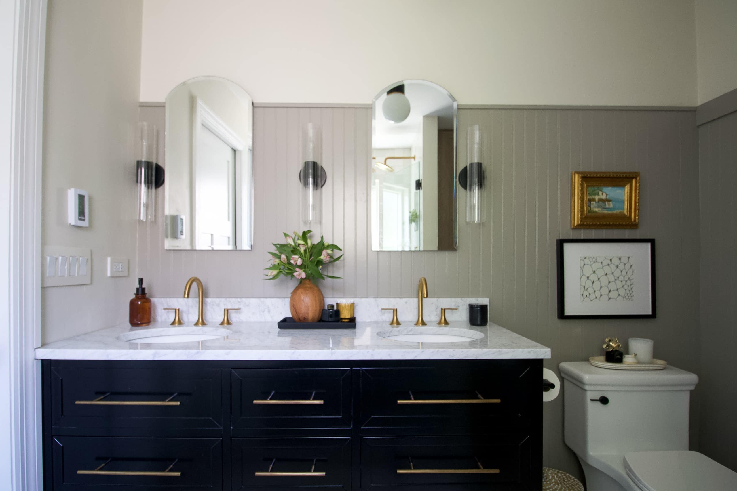 Beadboard behind a vanity in the bathroom