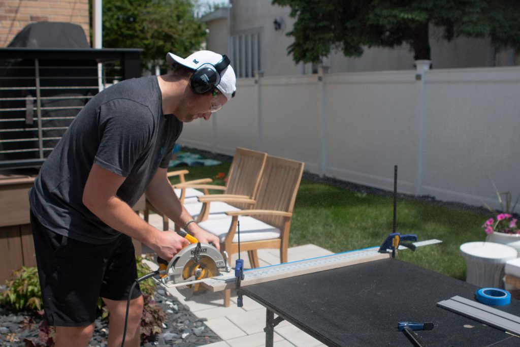 Finn cutting the wood