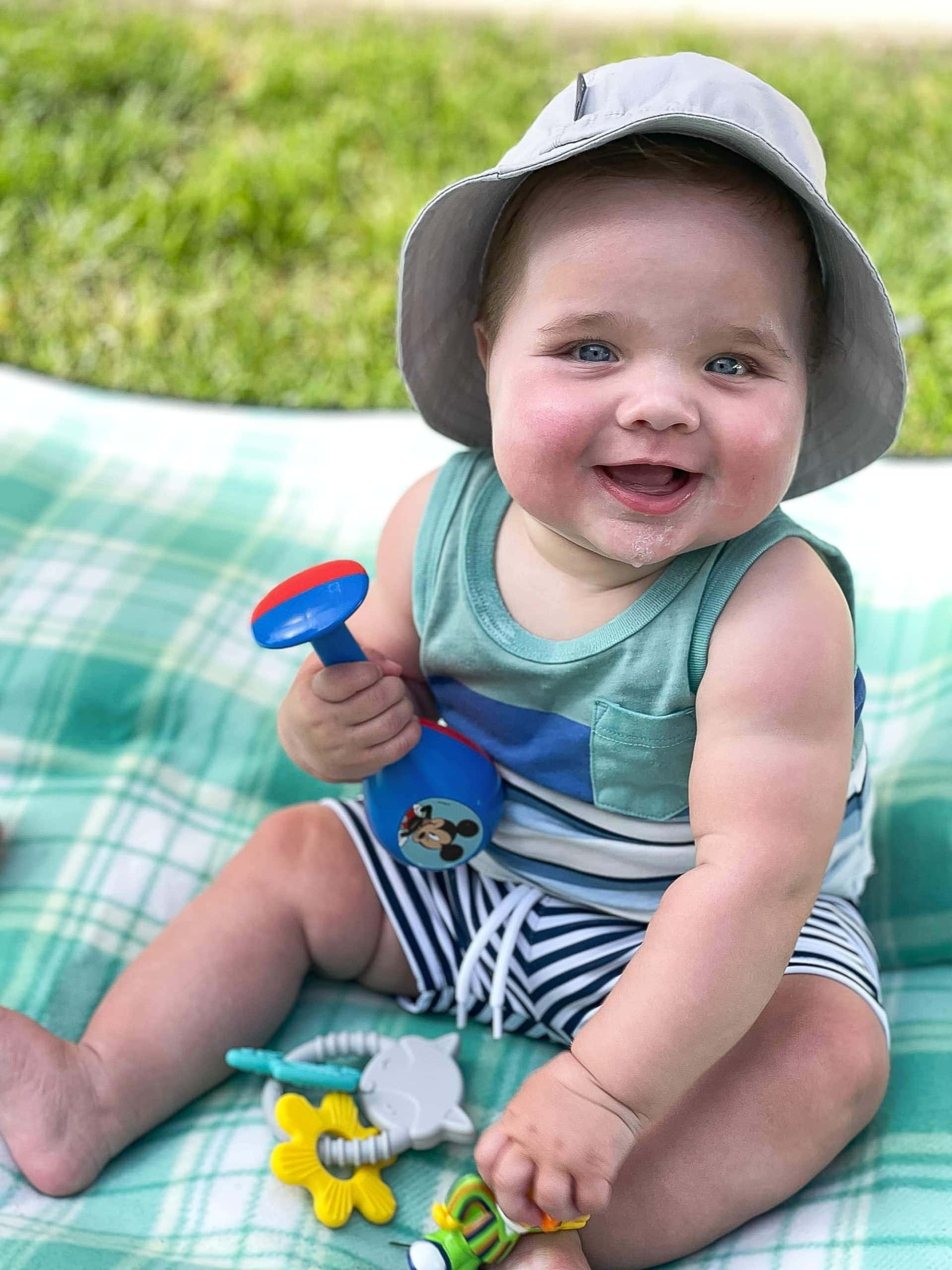 Ellis sitting in the grass