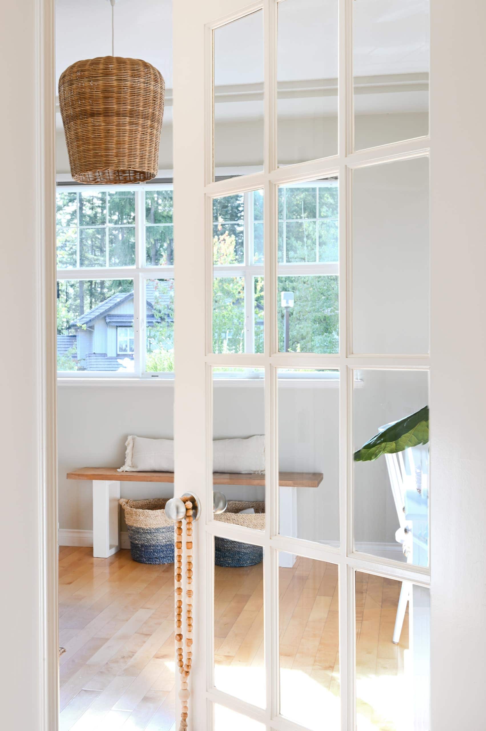 Bench in a mudroom off a garage