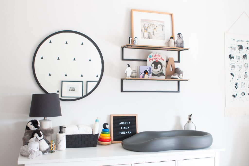 nursery dresser set up in a city chic condo