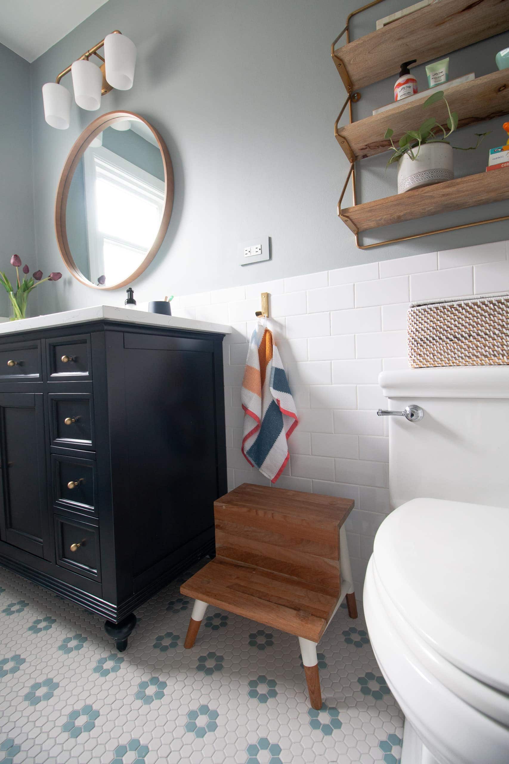 Cute step stool in the kids' bathroom