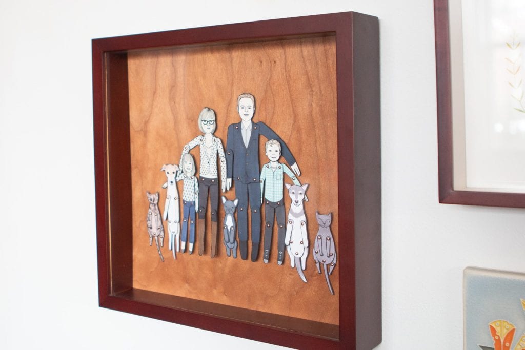 Cute family portrait in a gallery wall