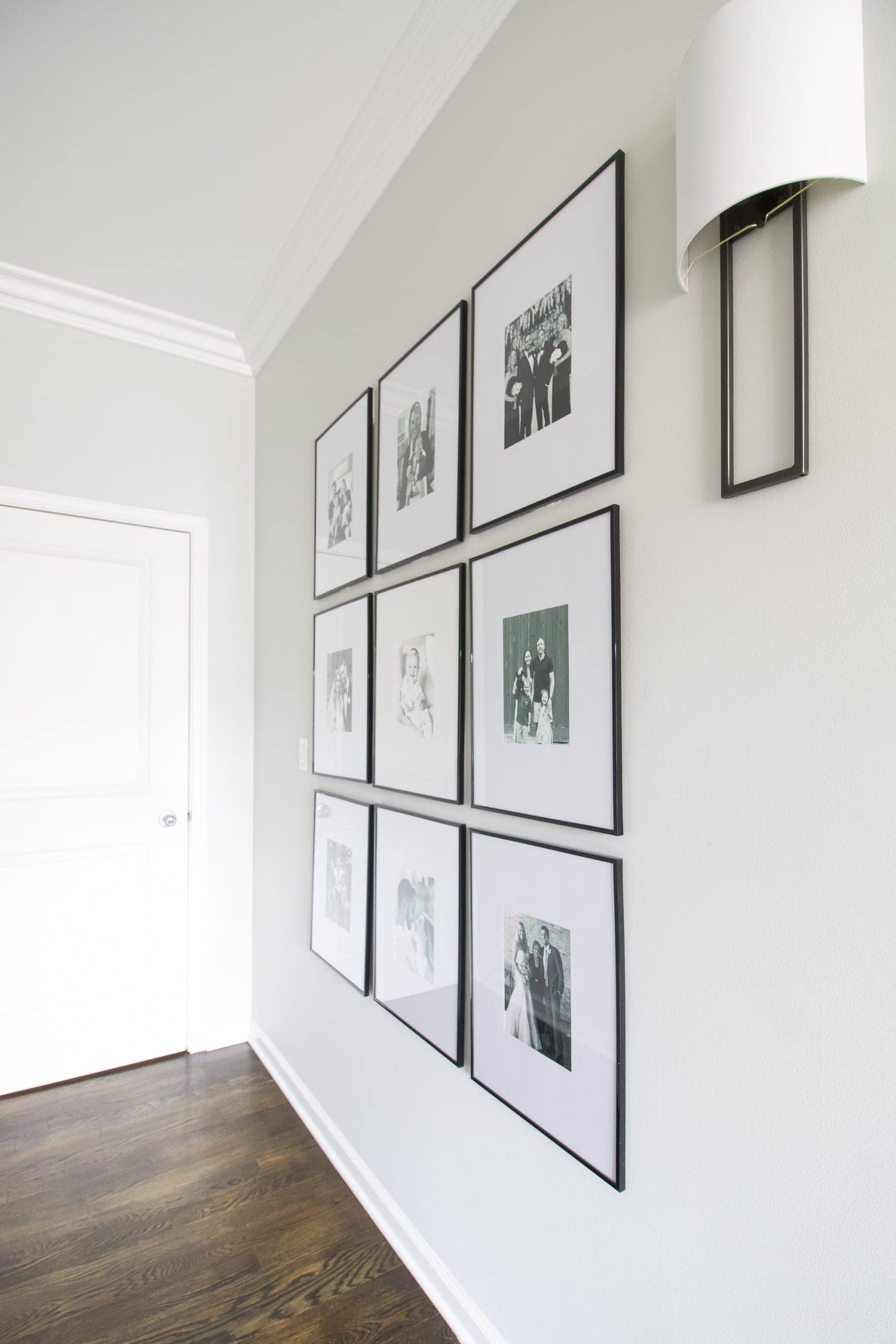 Symmetrical gallery wall in a hallway