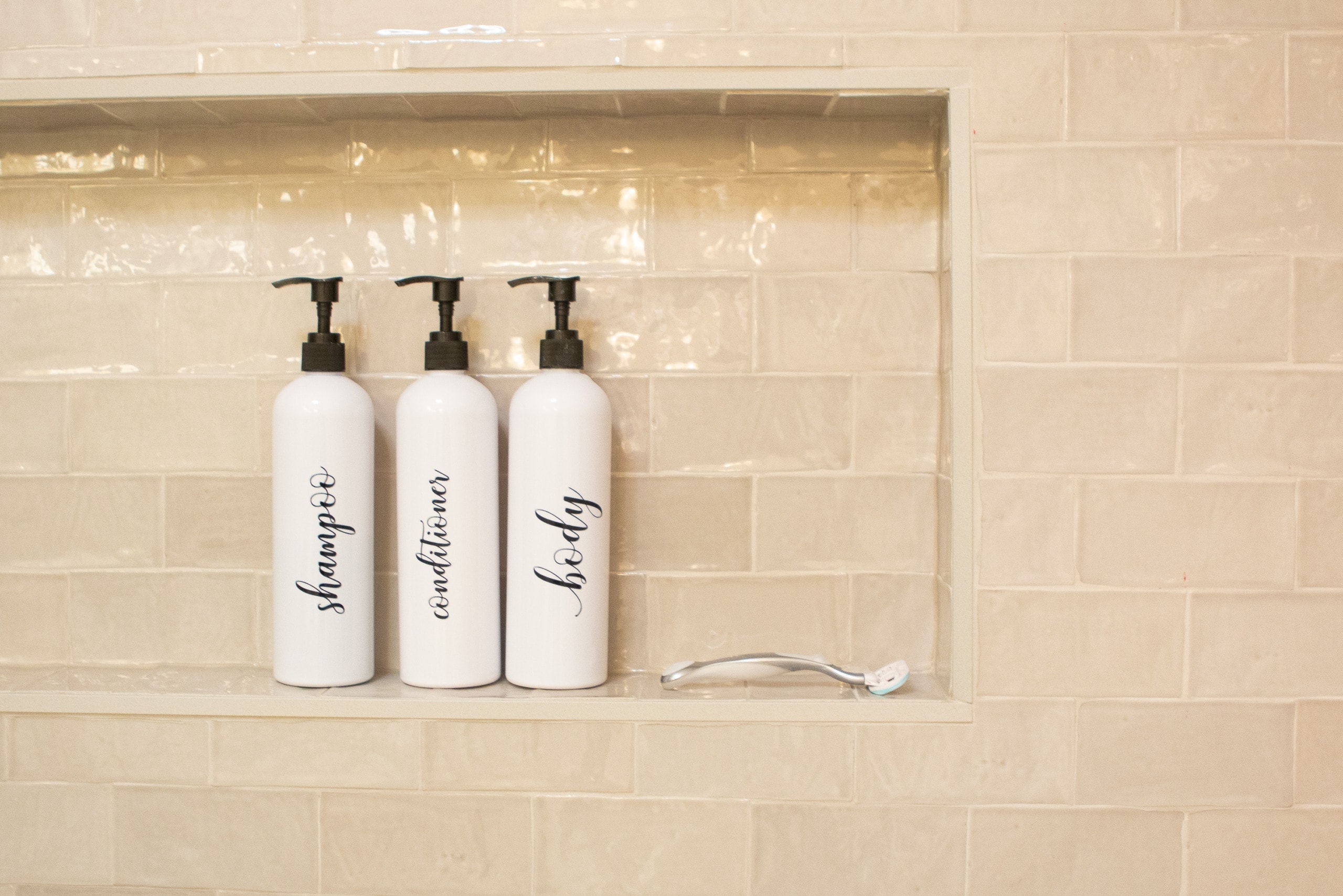 Taupe tile in the shower