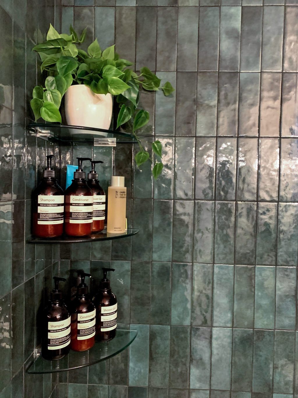 glass tile bathroom with green tile