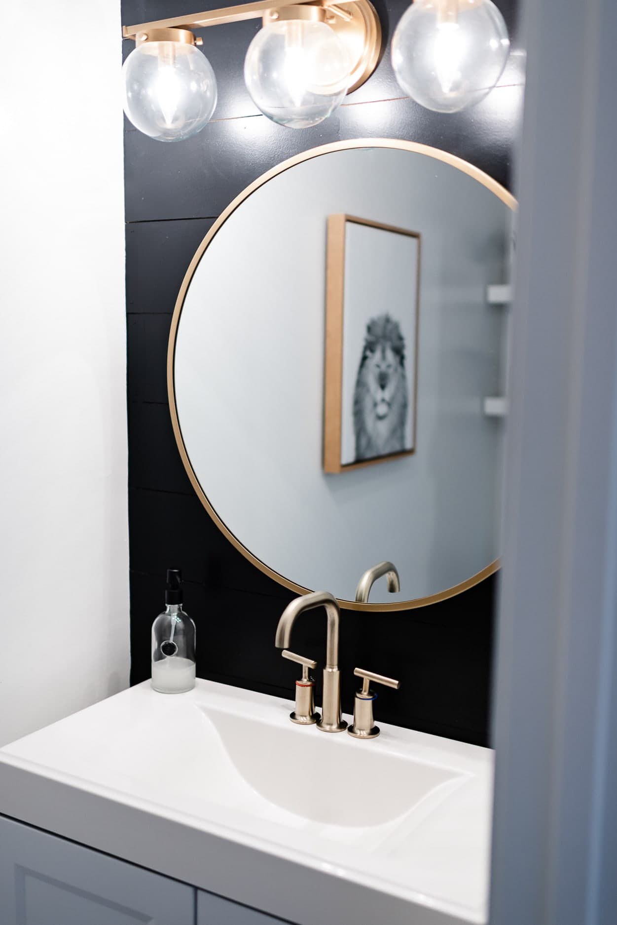 Black and gold powder room 