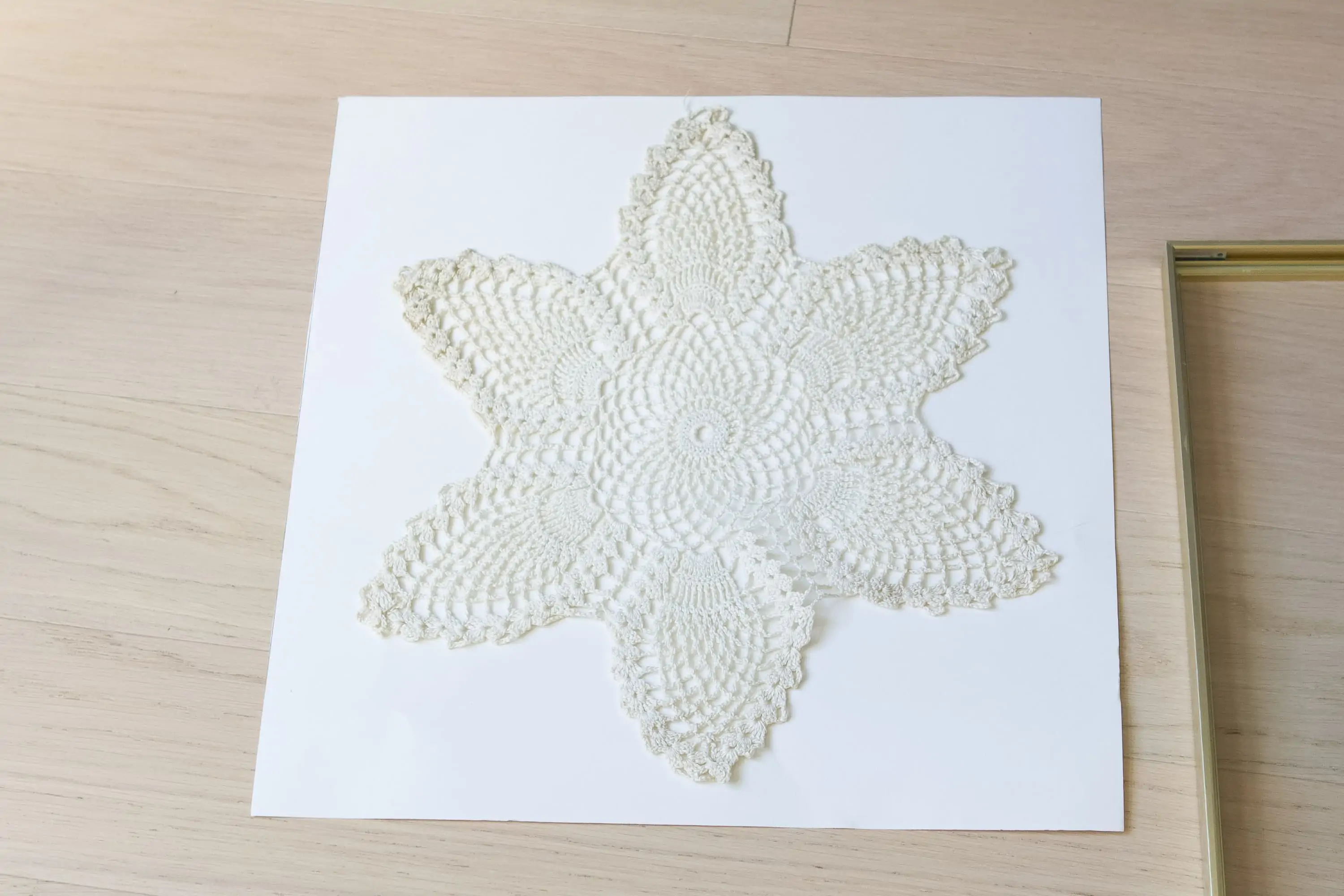 Using posterboard to display my doily