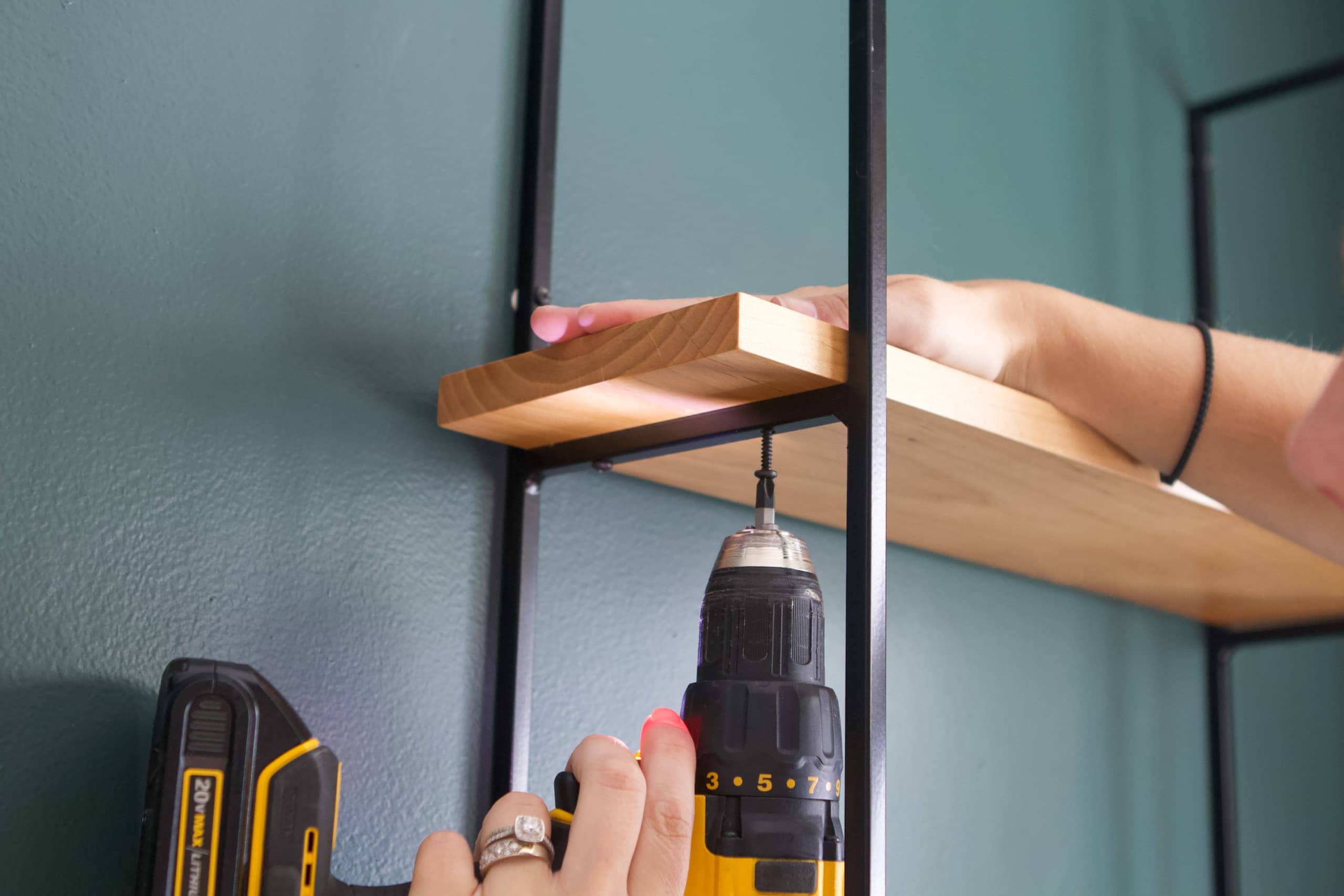 Securing wood on the shelves