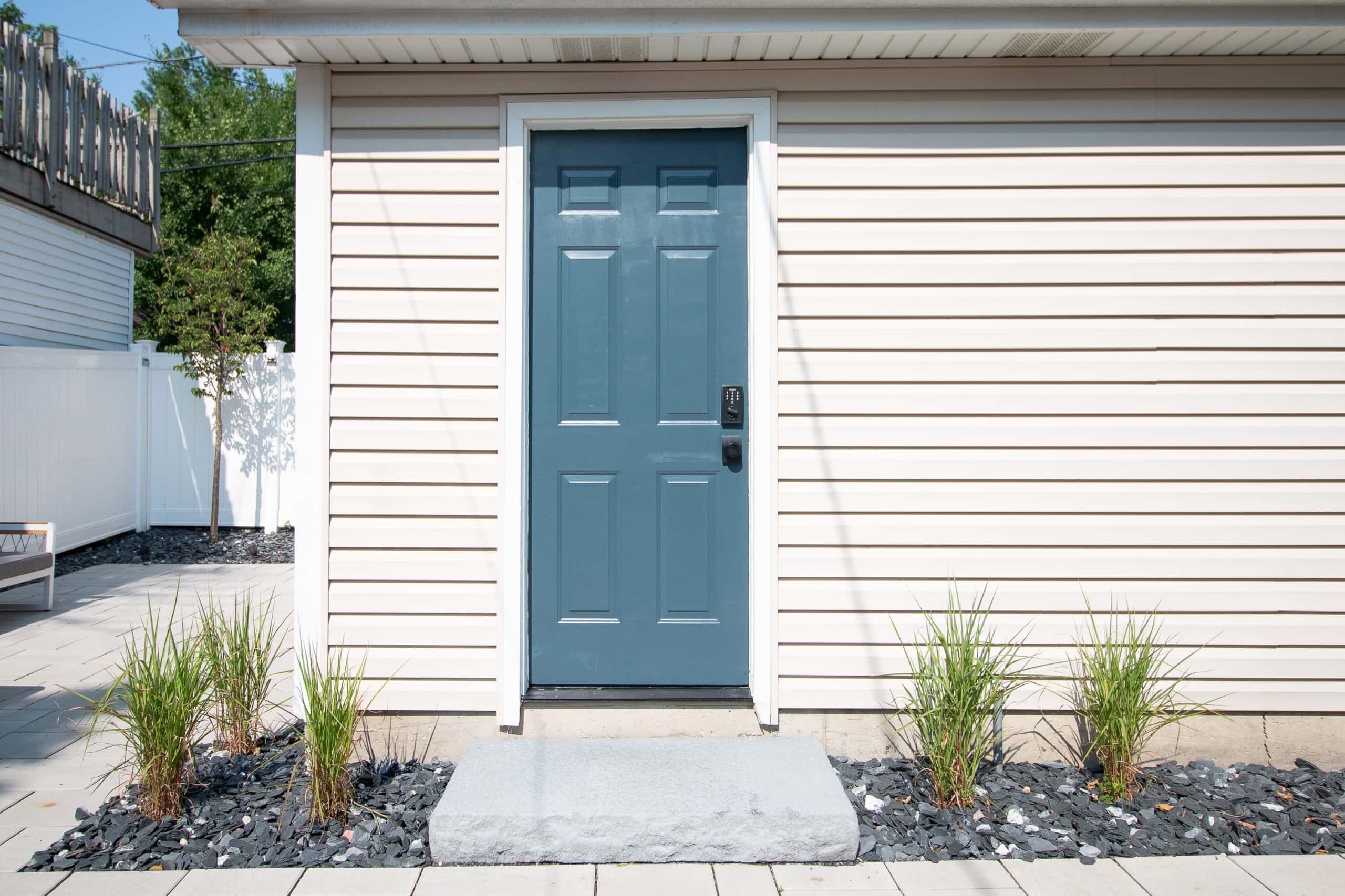 Painting our metal door a pretty navy blue