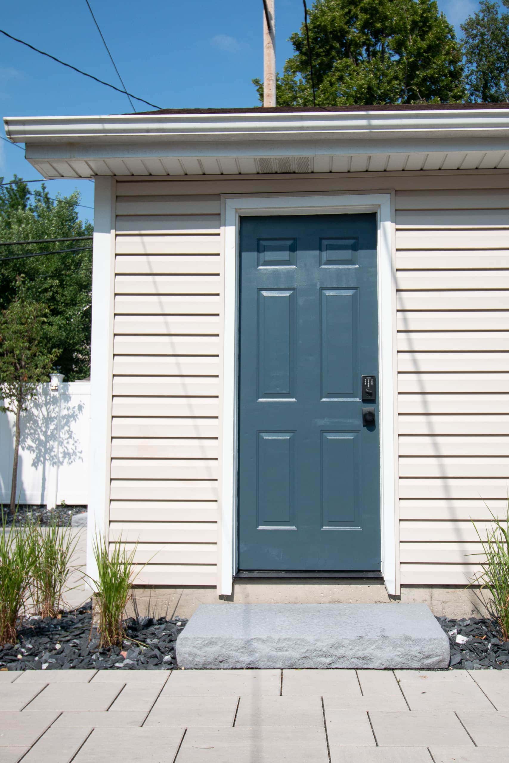 Painting our metal door to the garage a navy blue