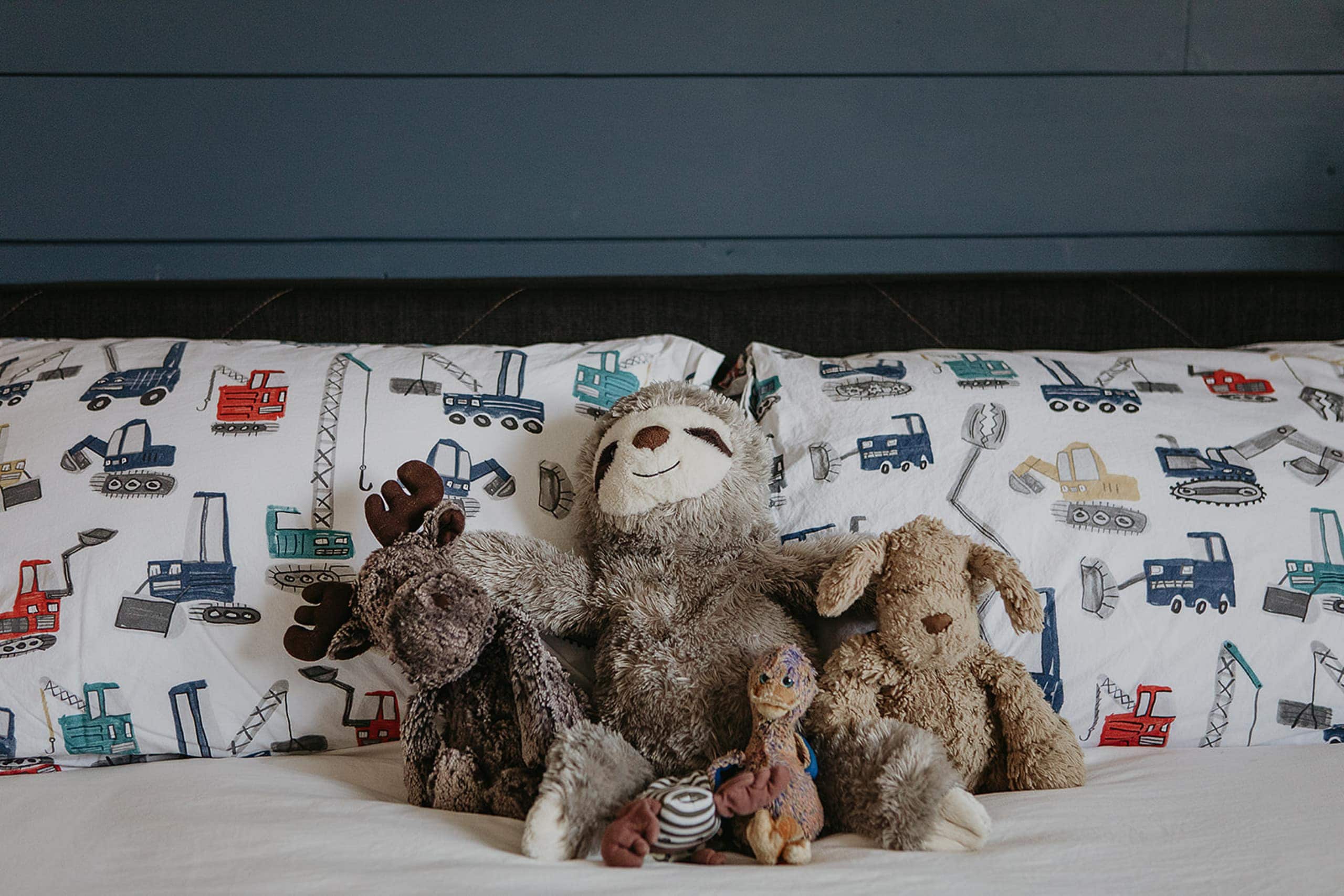 Stuffed animals on the bed