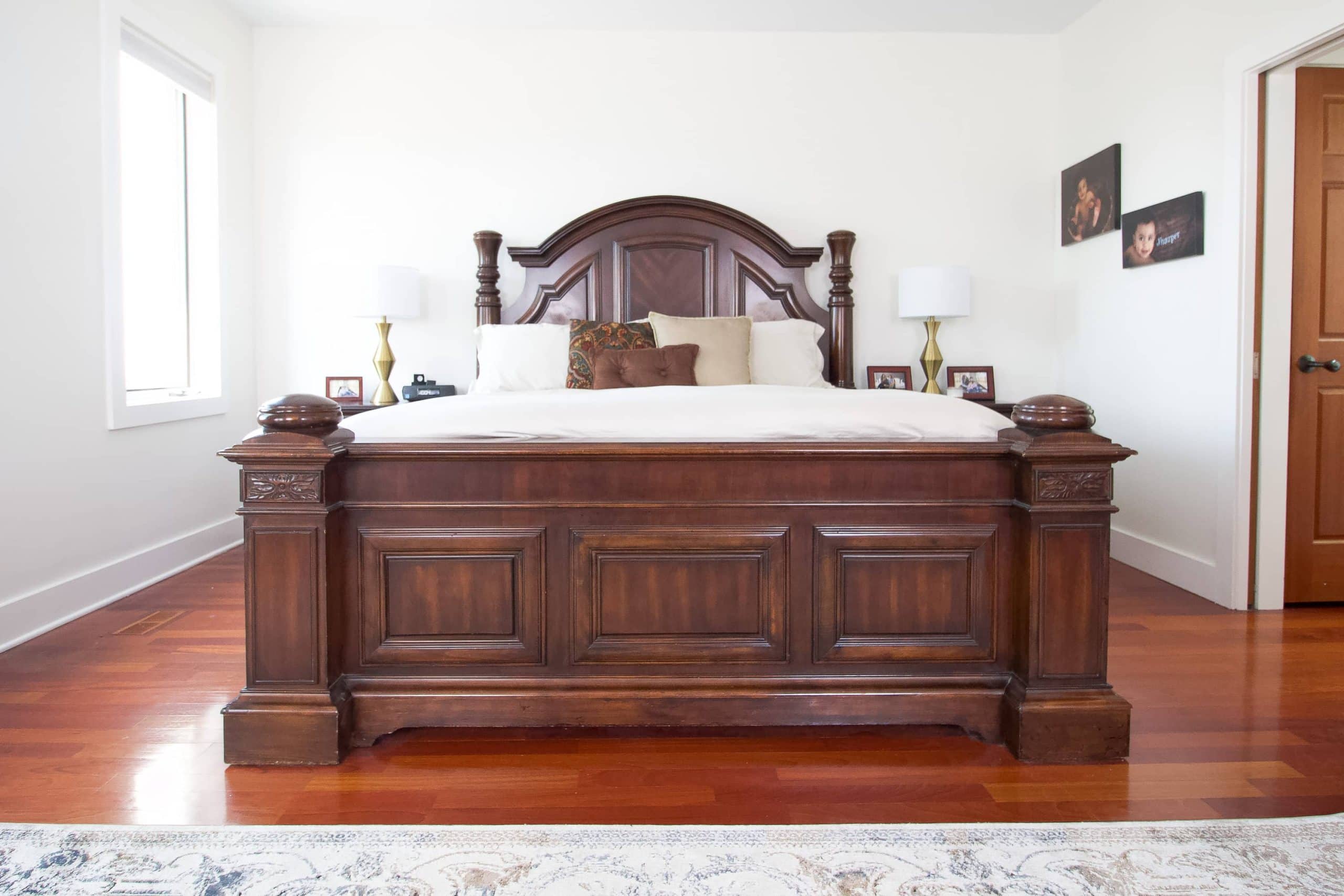 Main bedroom with dark wood furniture