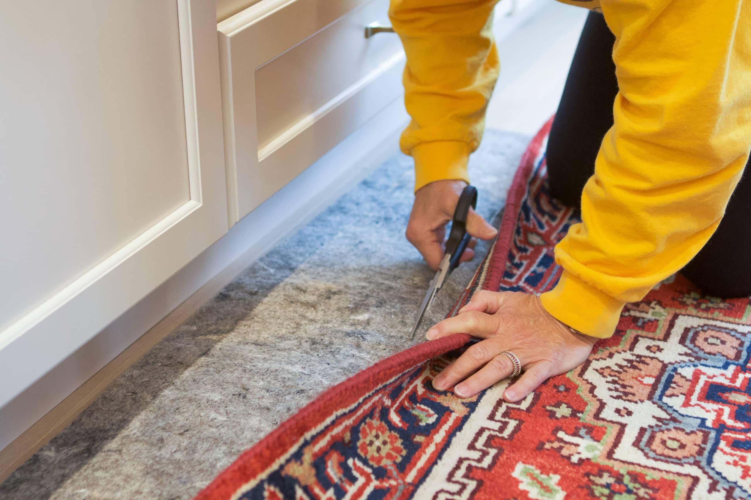 Jan cutting my rug pad down to size