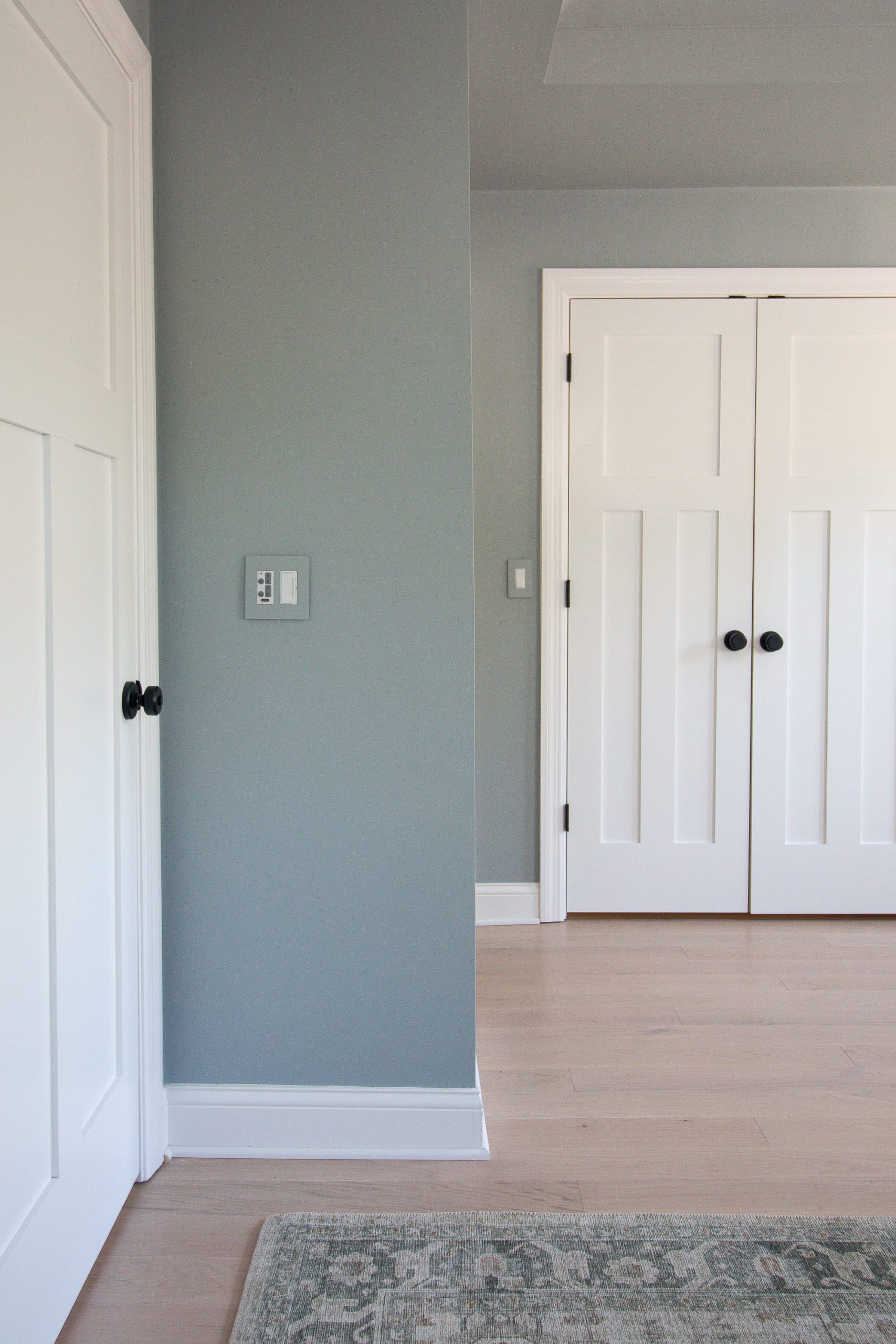 Painting the outlet covers in our bedroom