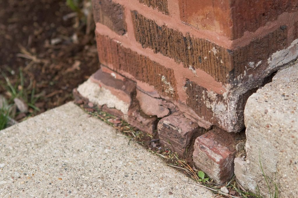 Crumbling red brick on our Chicago home