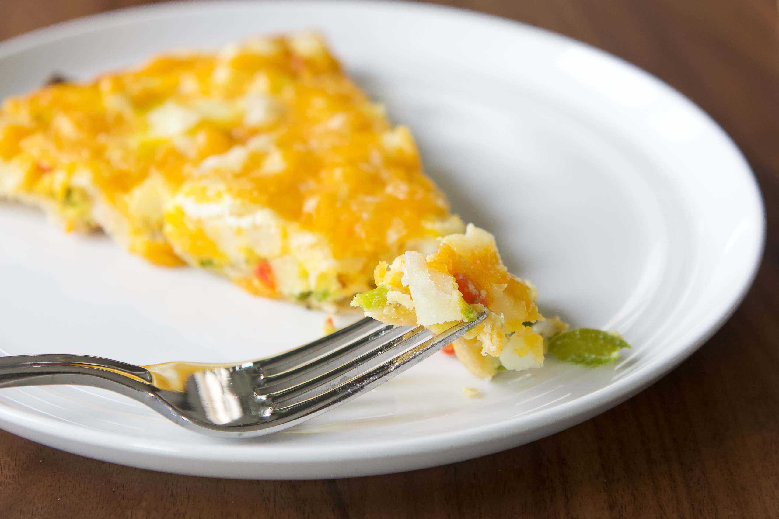 How to make cheesy breakfast pizza