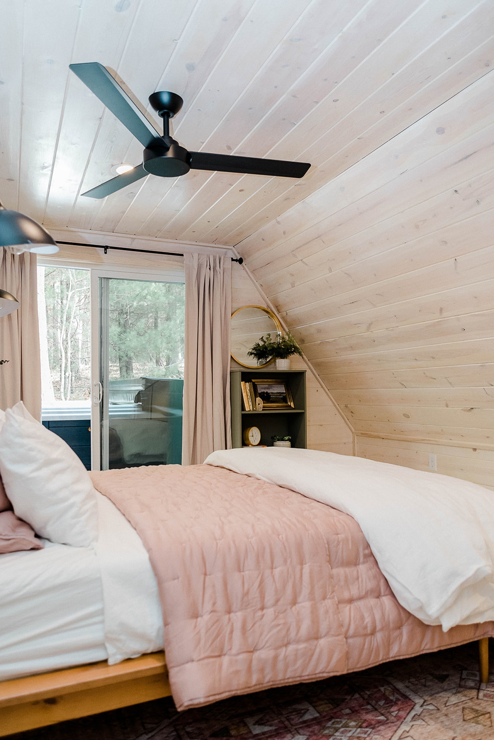 Pink bedroom in the a-frame cabin