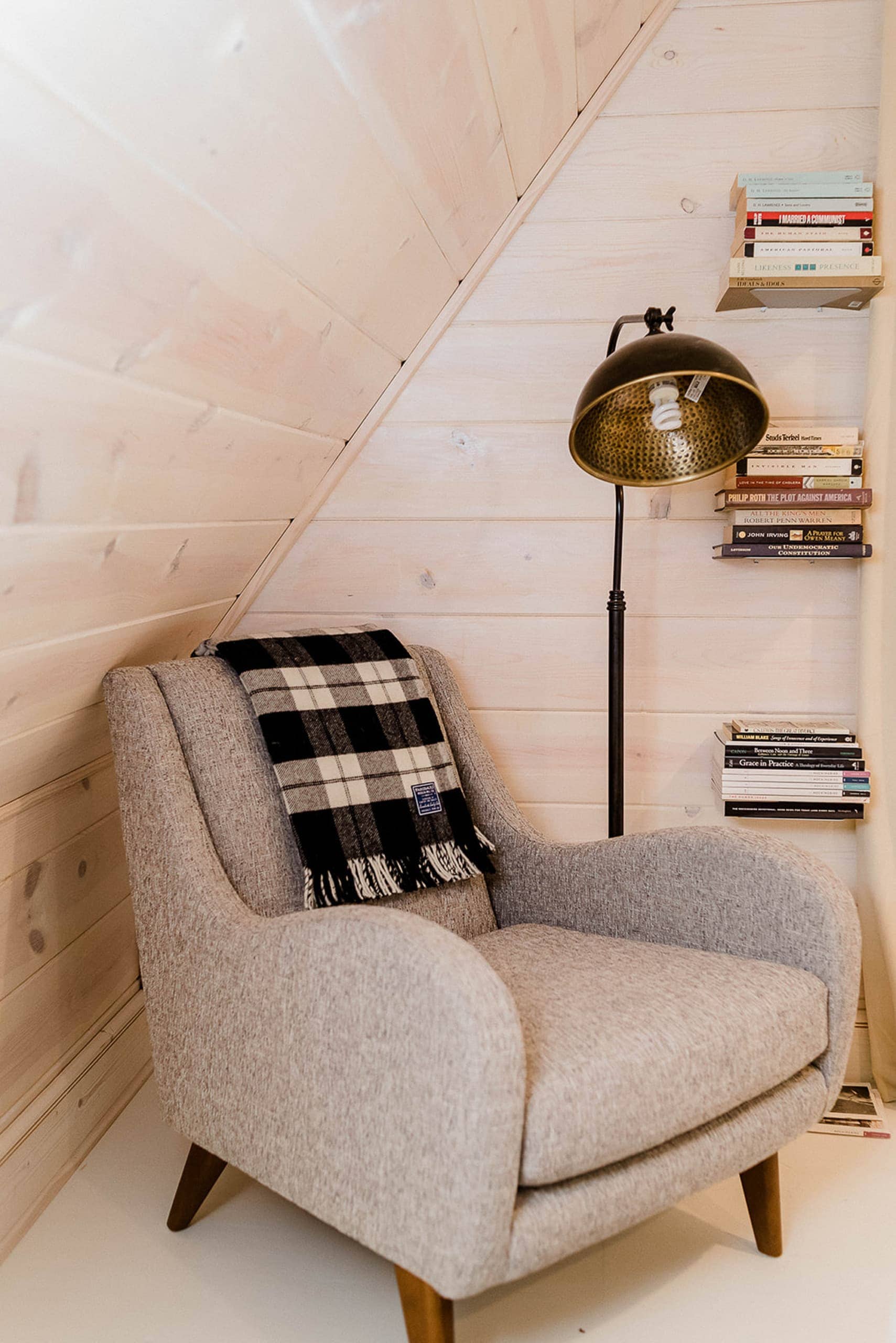 Cute chair in the corner of this bedroom