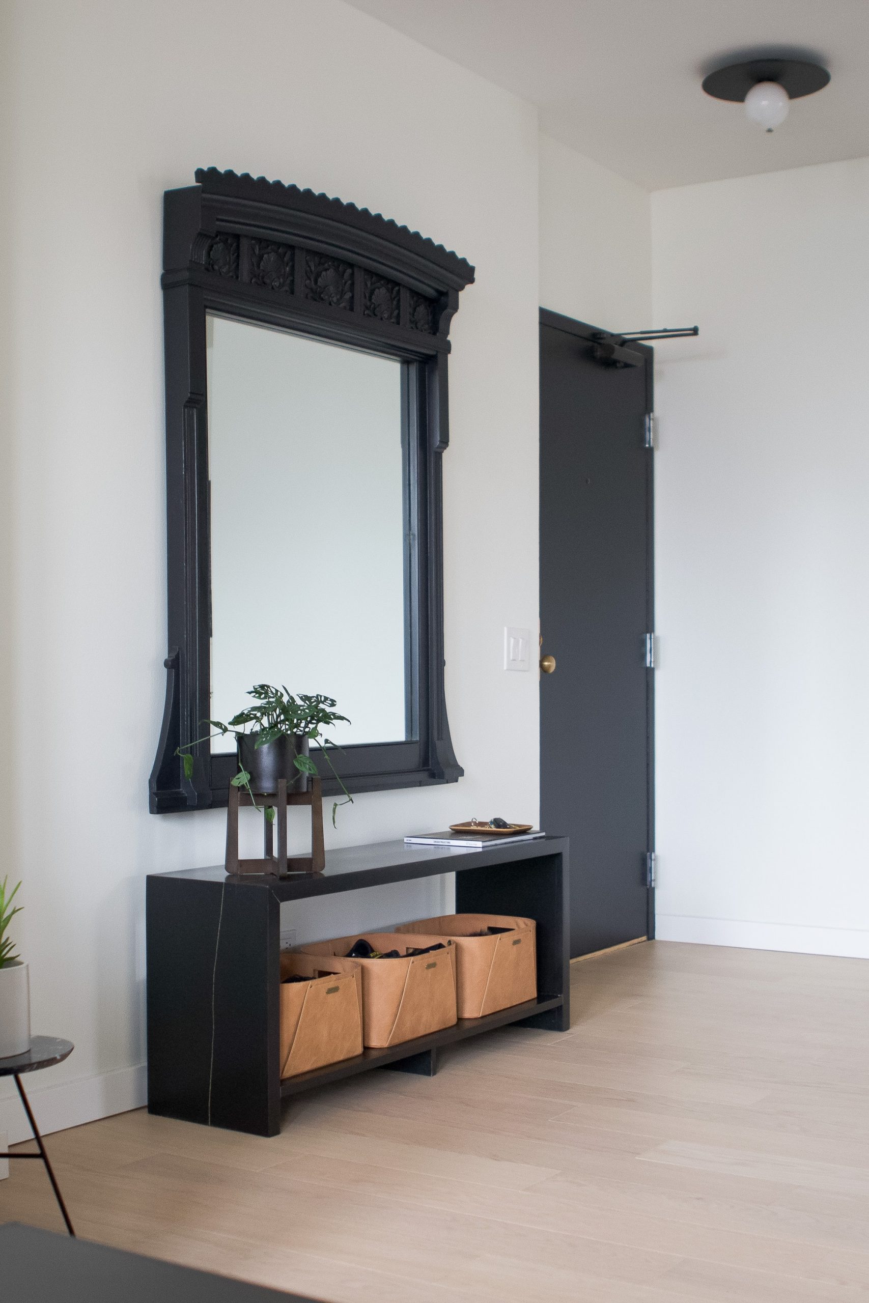 Black entryway mirror