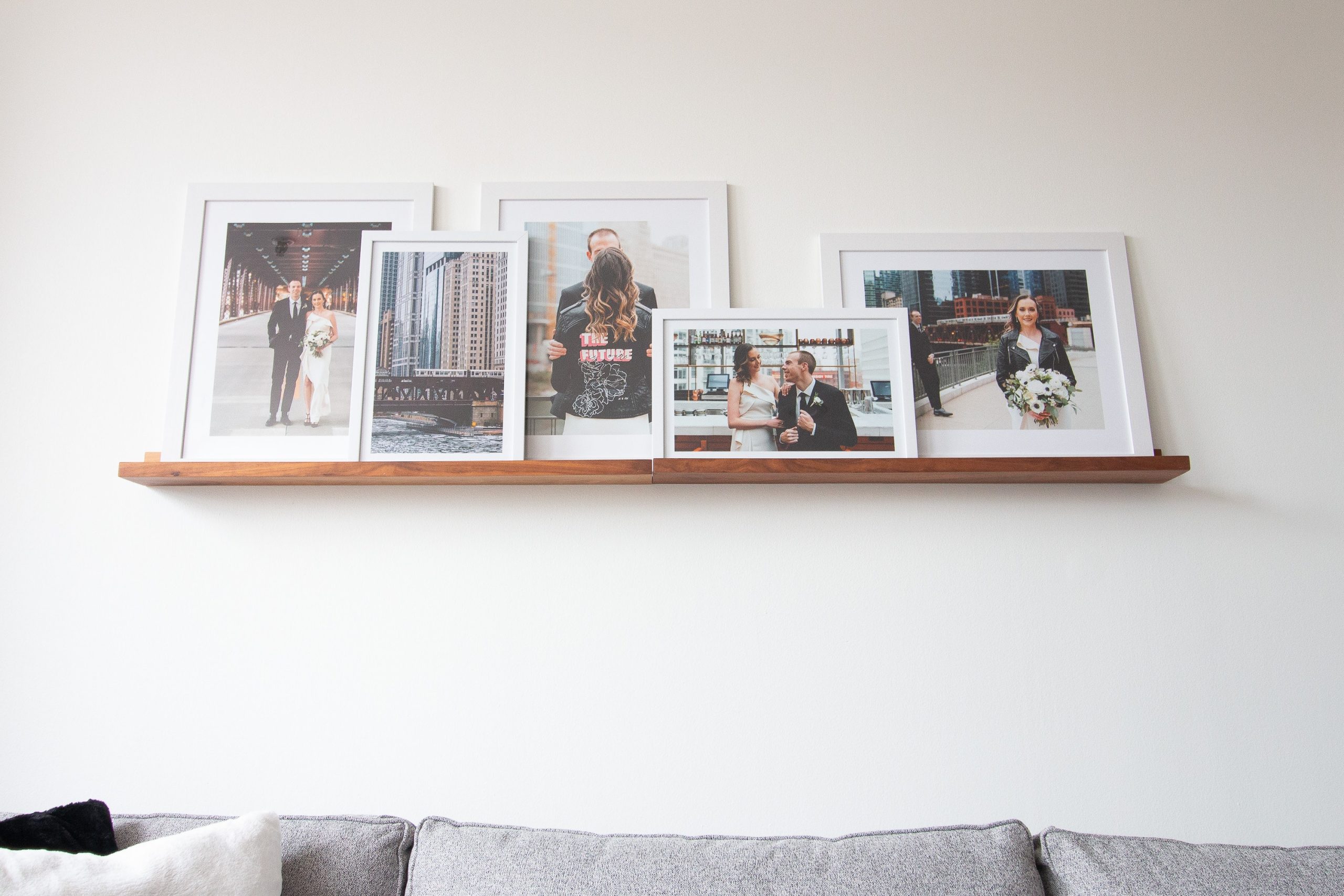 Picture ledge with wedding frames