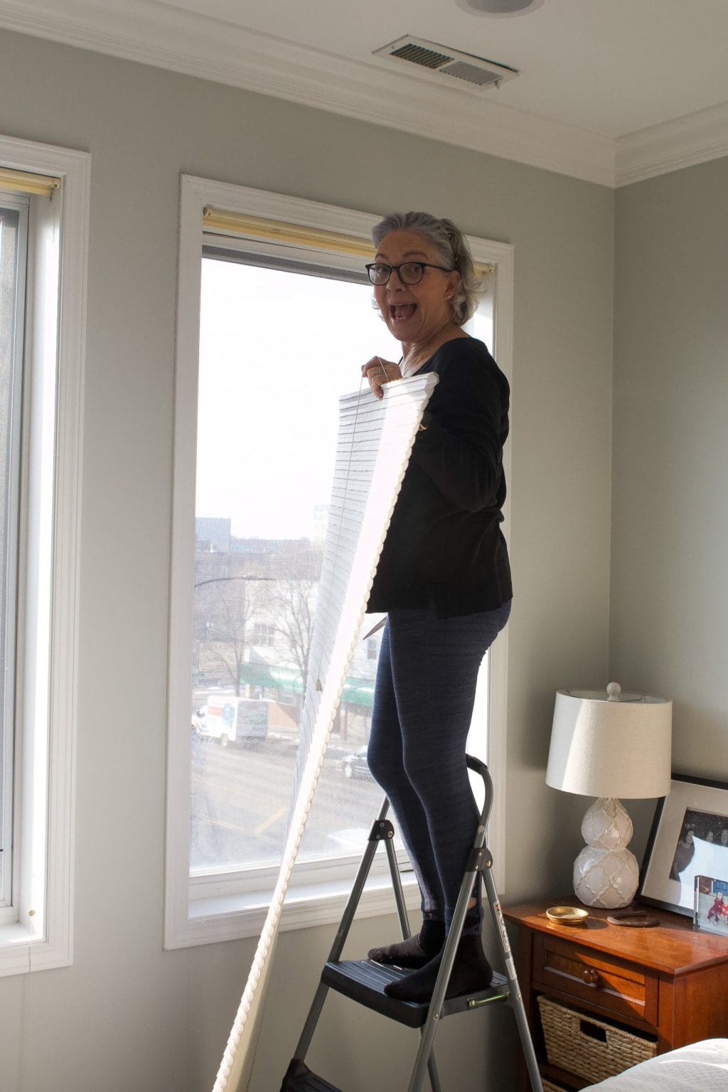 Jan removing the old window treatments