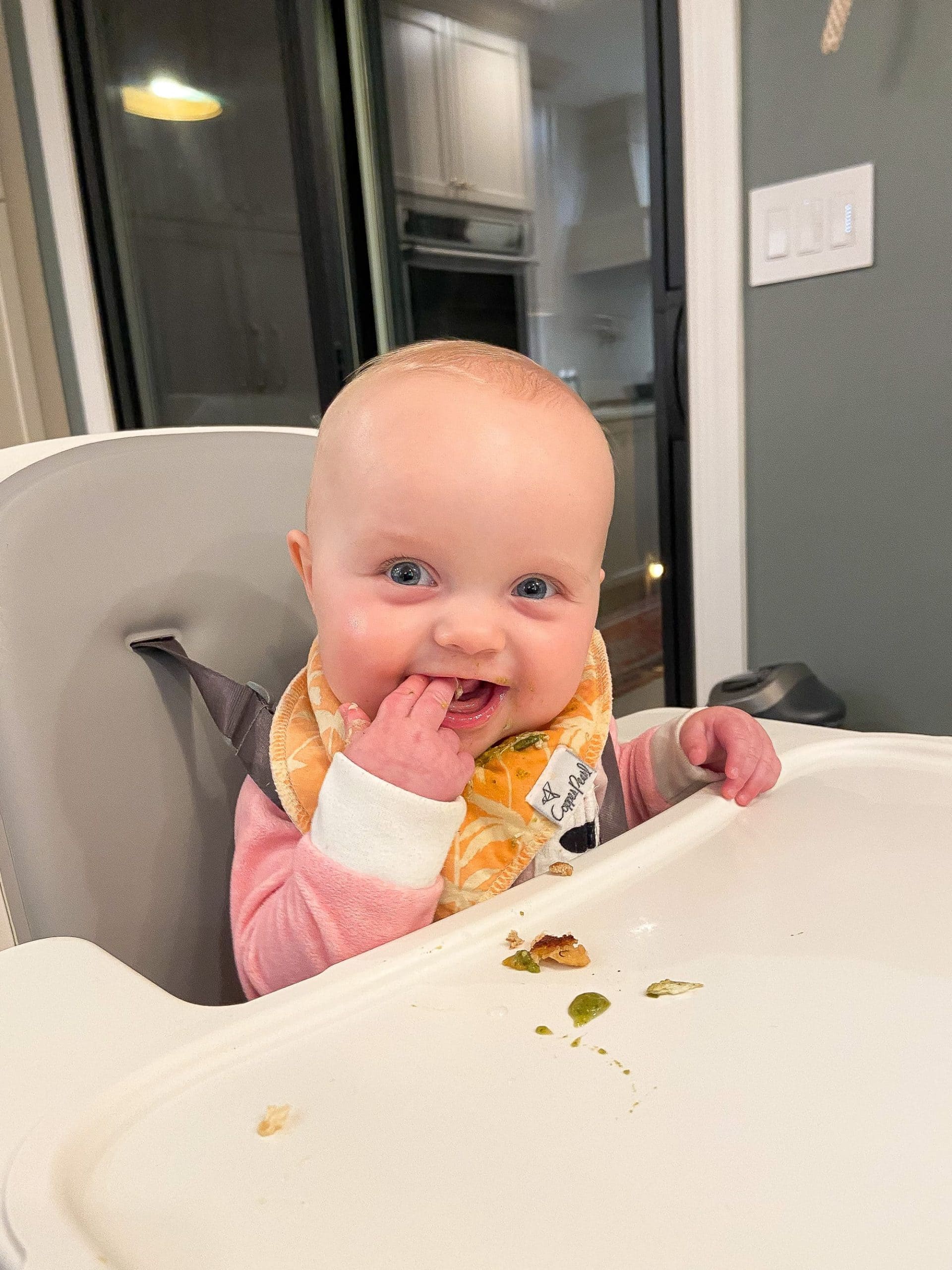 Rory eating with baby led weaning