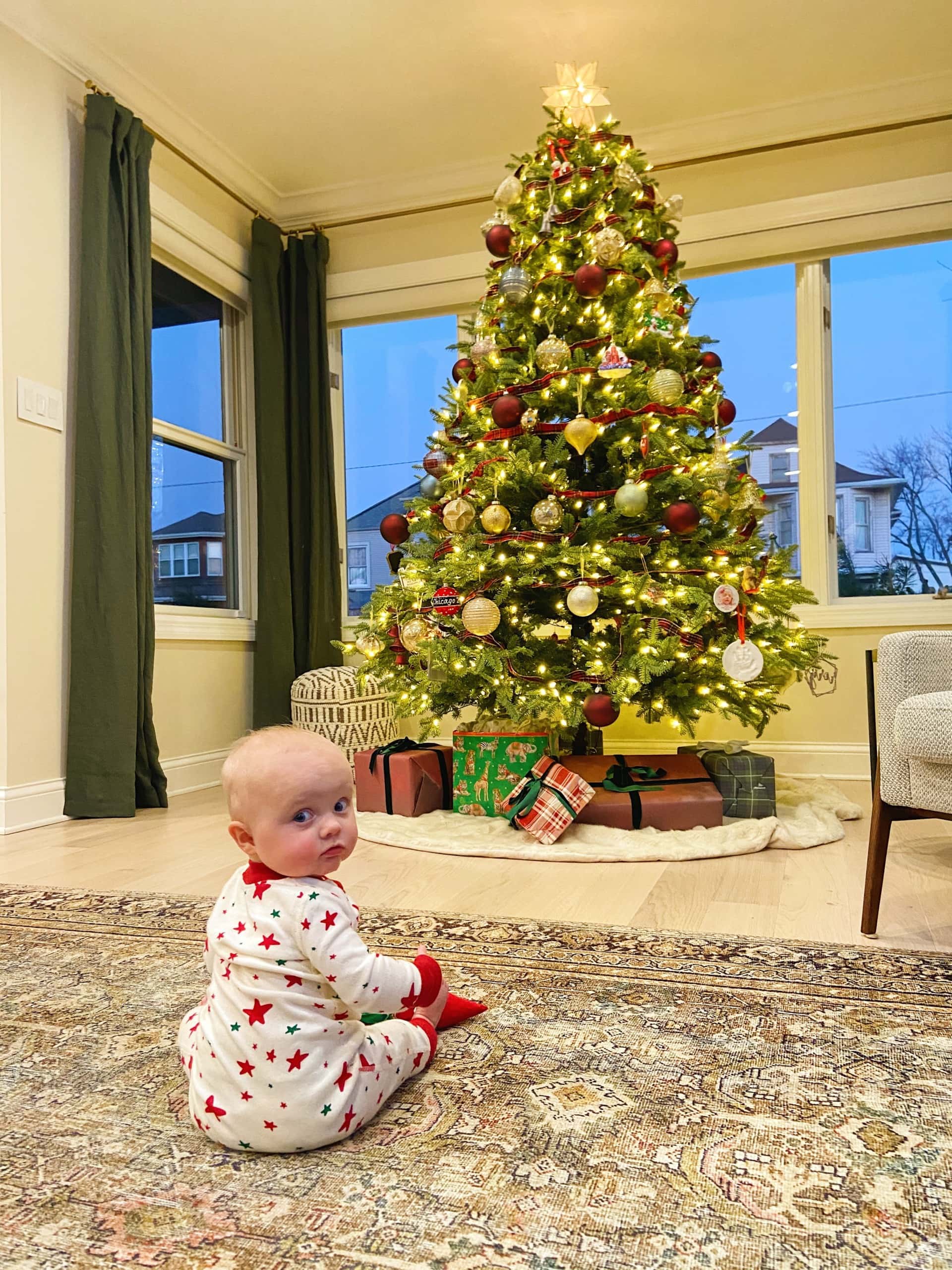 Rory in front of the Christmas tree