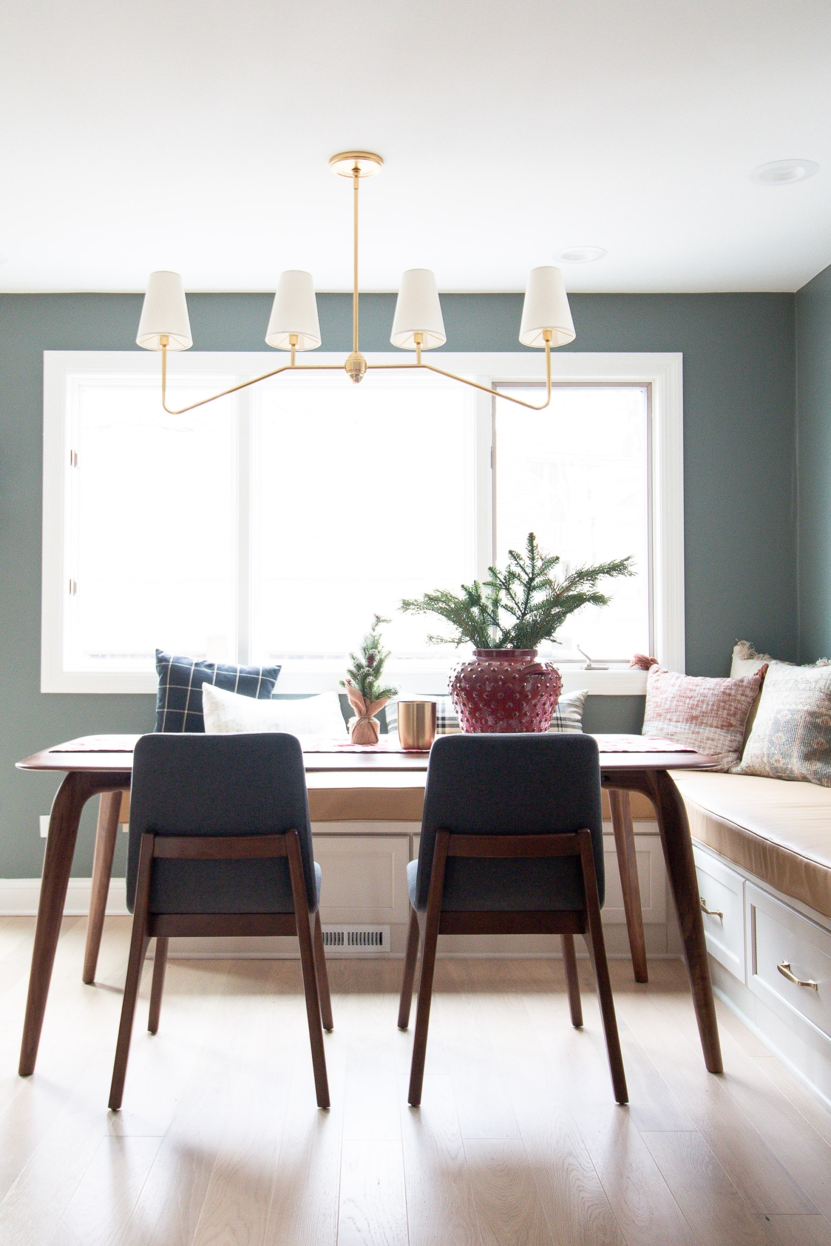 Adding Christmas touches to the dining room table