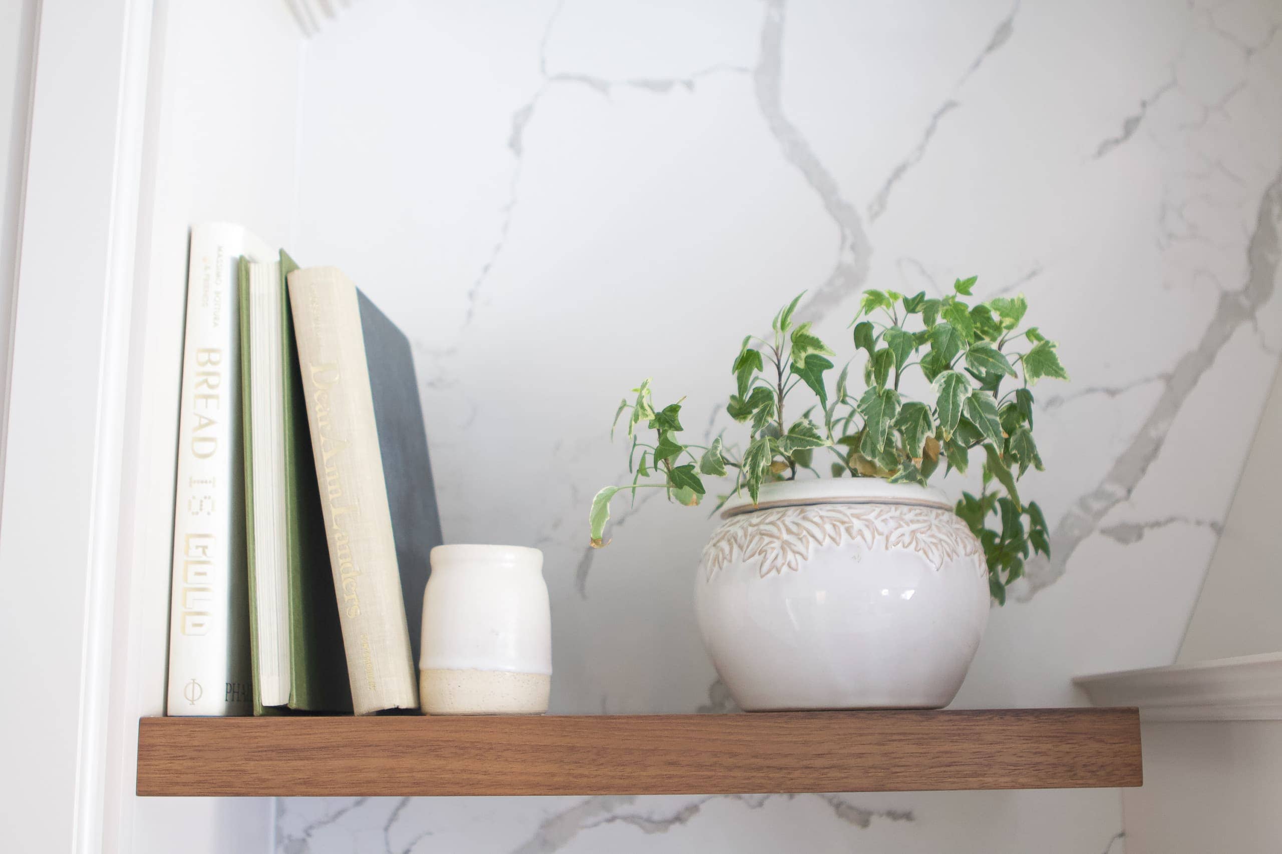 Adding kitchen decor to shelves